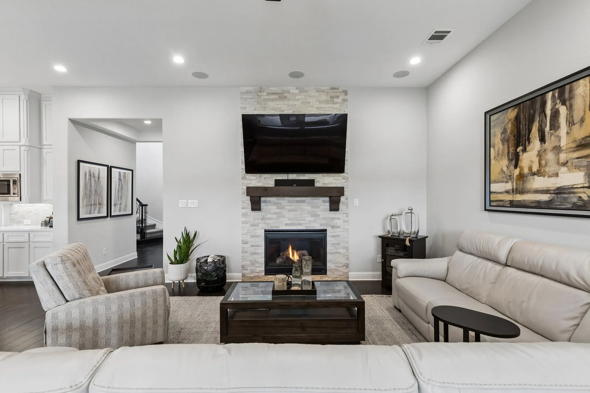 Cozy living room with gas fireplace and amazing view to open back yard with no rear neighbors