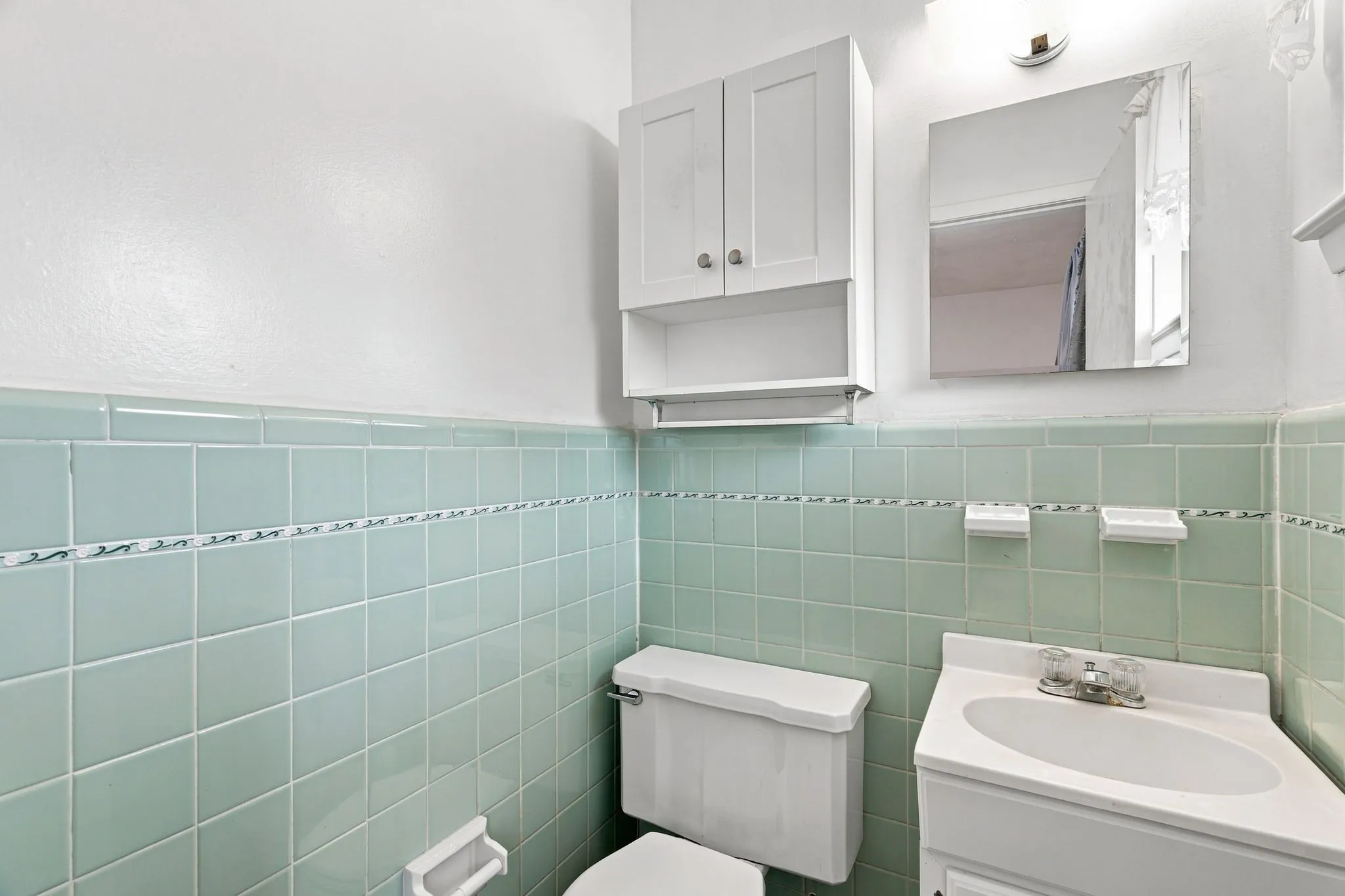 Half bathroom of 300 Parkwood Place, Lewisville, TX in Lakeland Terrace