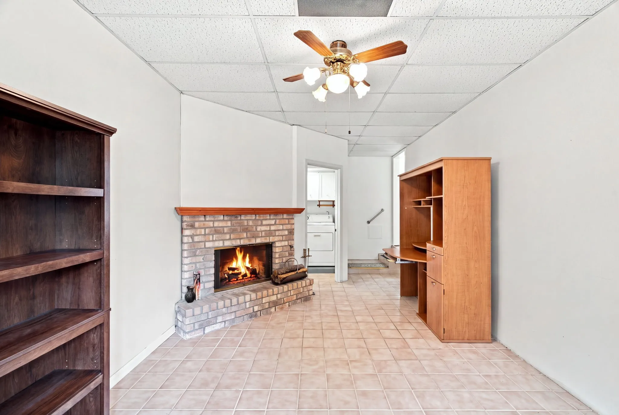 Comfortable den with fireplace of 300 Parkwood Place, Lewisville, TX in Lakeland Terrace