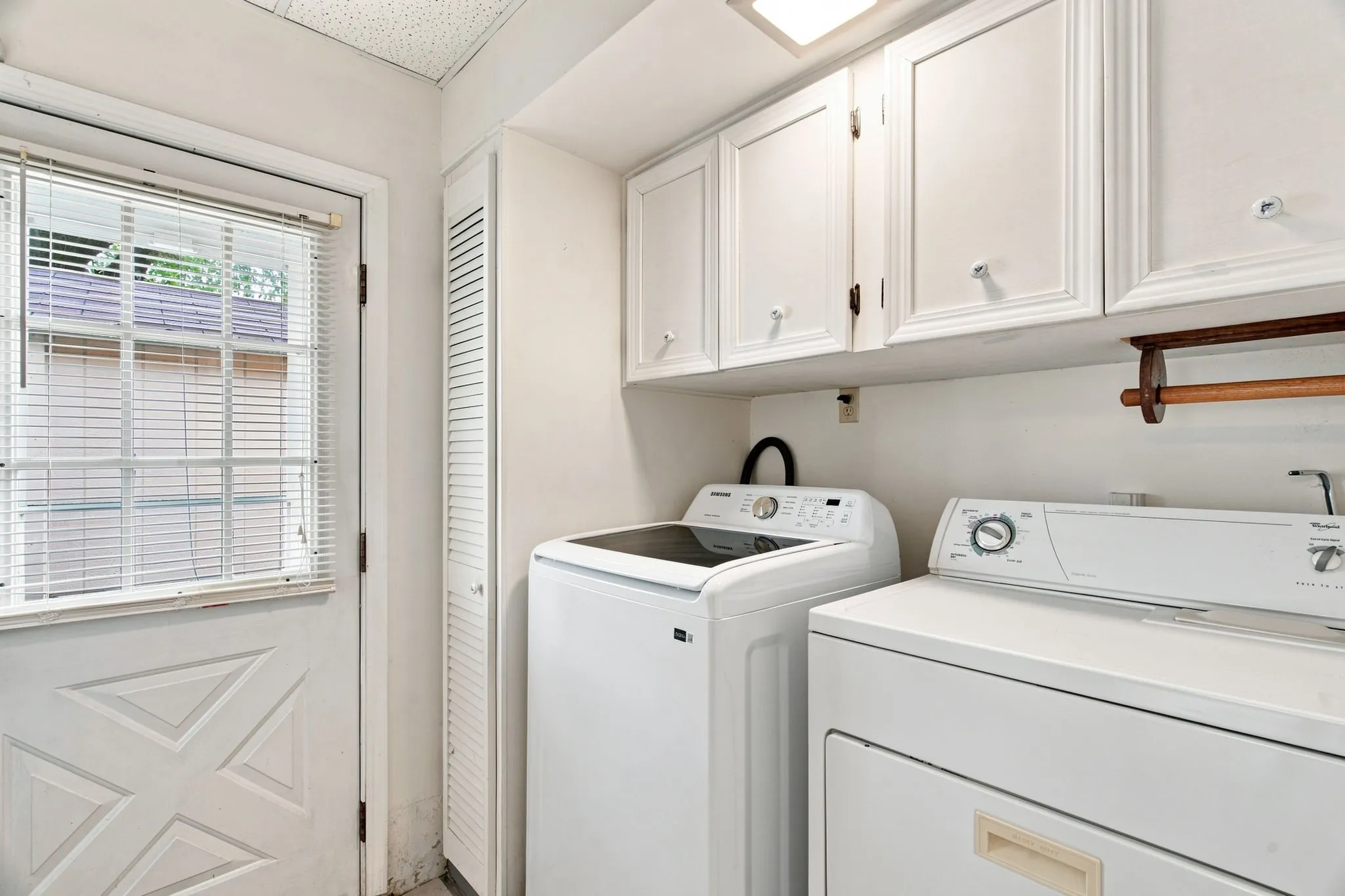 Utility laundry room of 300 Parkwood Place, Lewisville, TX in Lakeland Terrace