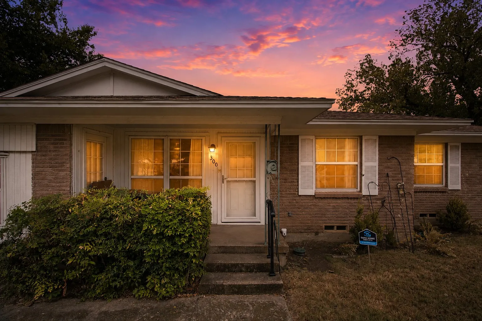 Twilight Front of the home of 300 Parkwood Place, Lewisville, TX in Lakeland Terrace
