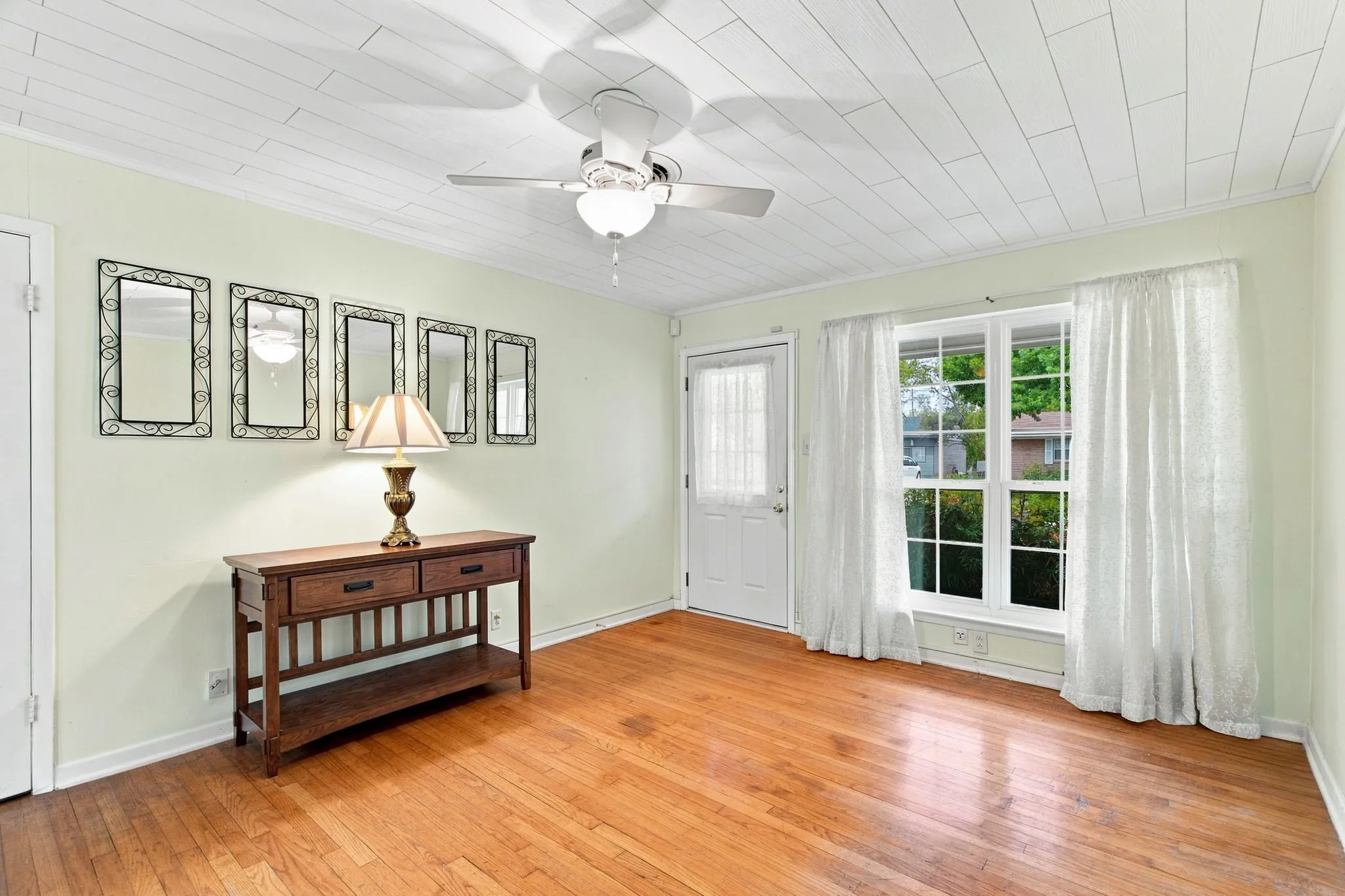 Light and bright front living room of 300 Parkwood Place, Lewisville, TX in Lakeland Terrace