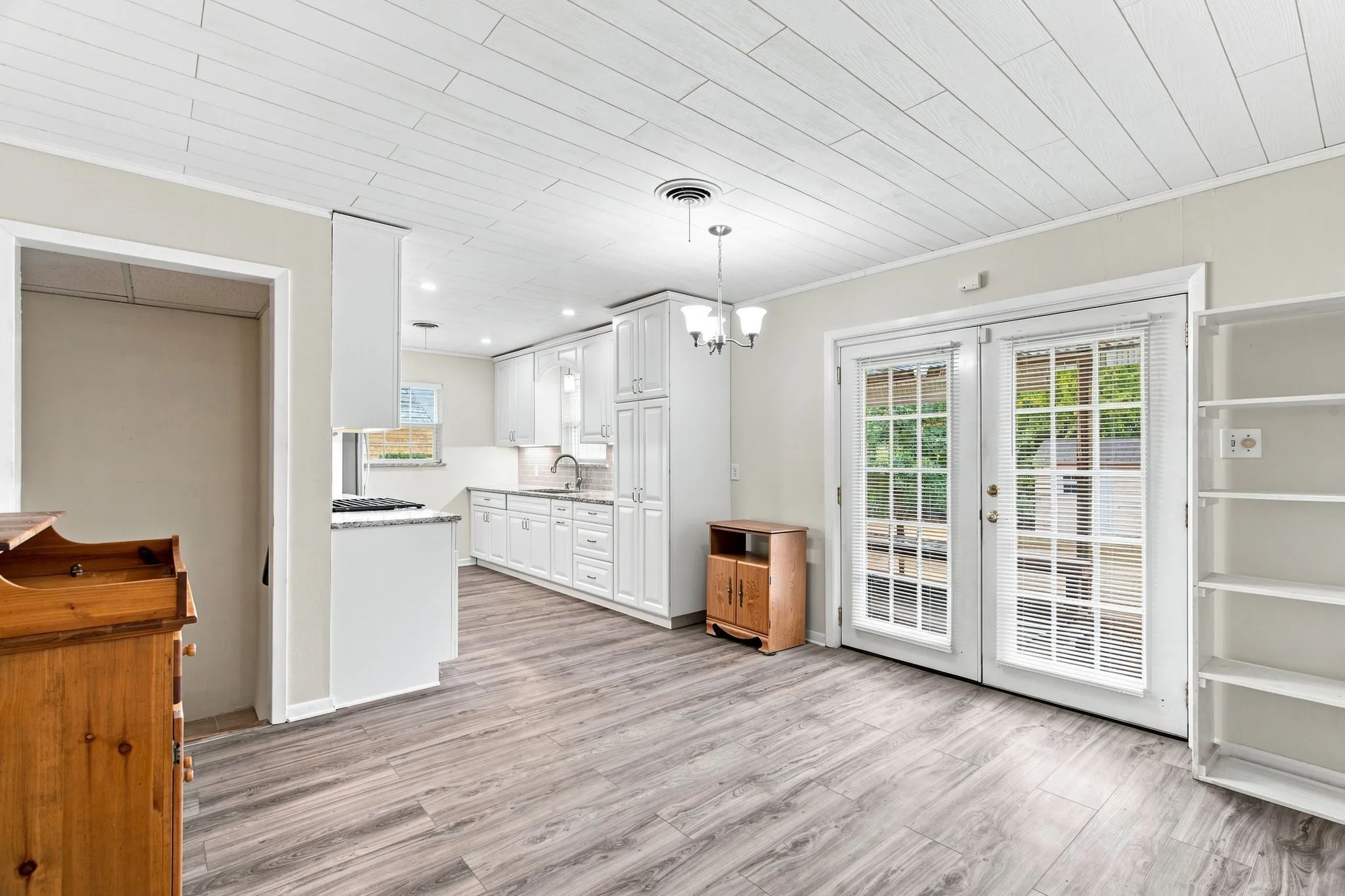 Dining Area with French doors to the backyard of 300 Parkwood Place, Lewisville, TX in Lakeland Terrace