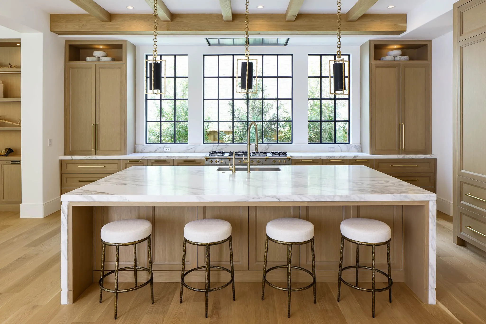 Gourmet Kitchen with Wood Mode cabinetry custom pendant lighting