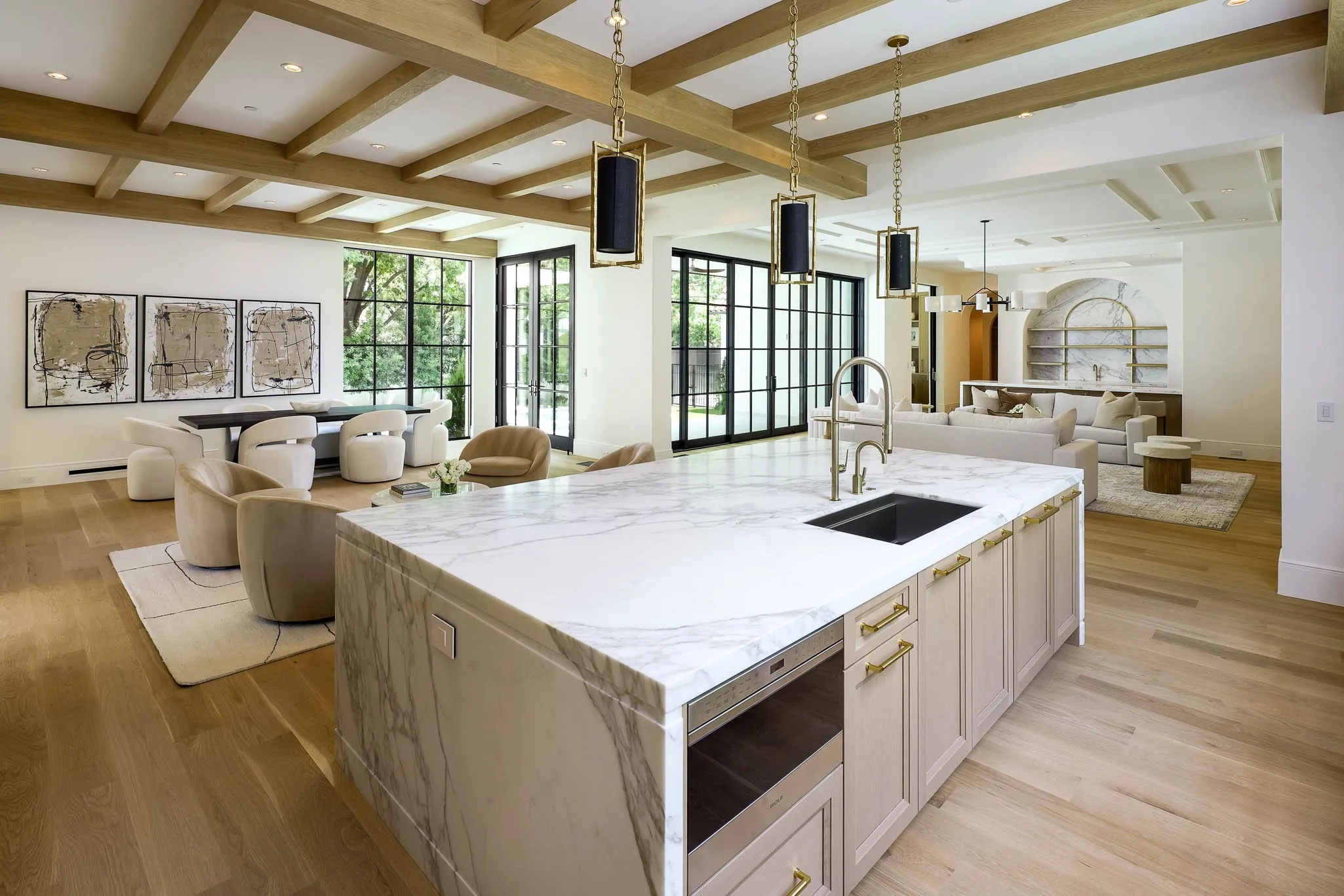 View of the Gourmet Kitchen island with Wood Mode cabinetry and marble countertops