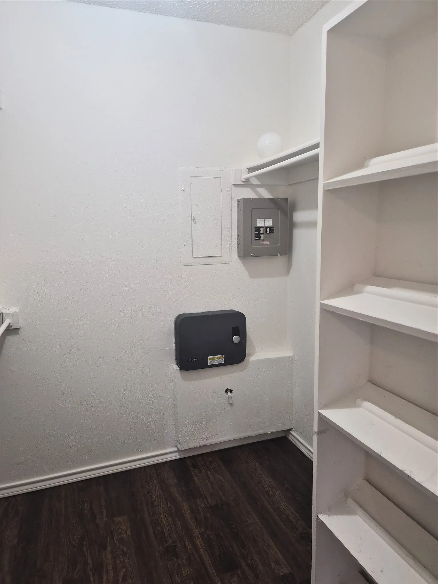 Master closet with electric tankless waterheater