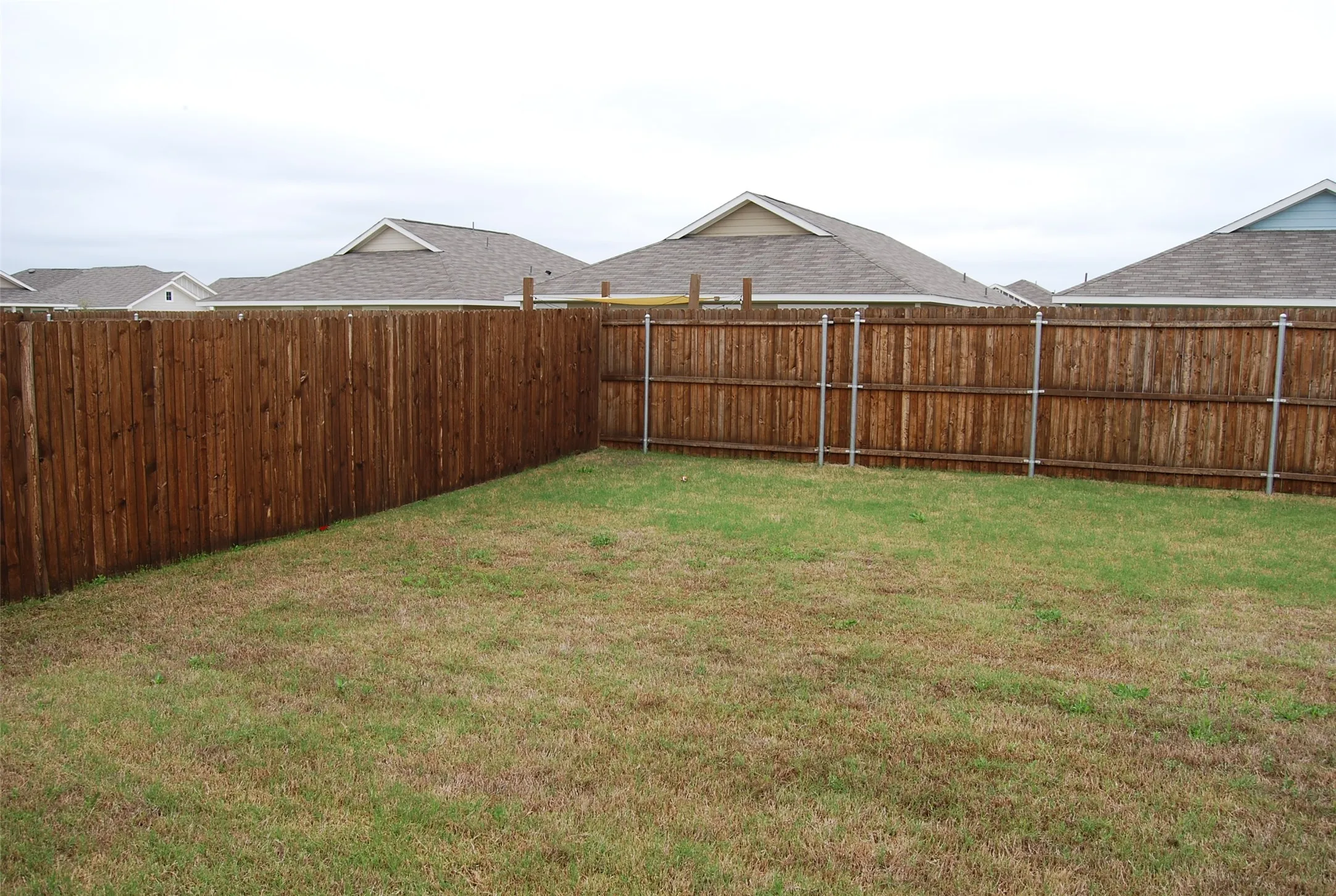 Large fenced back yard.