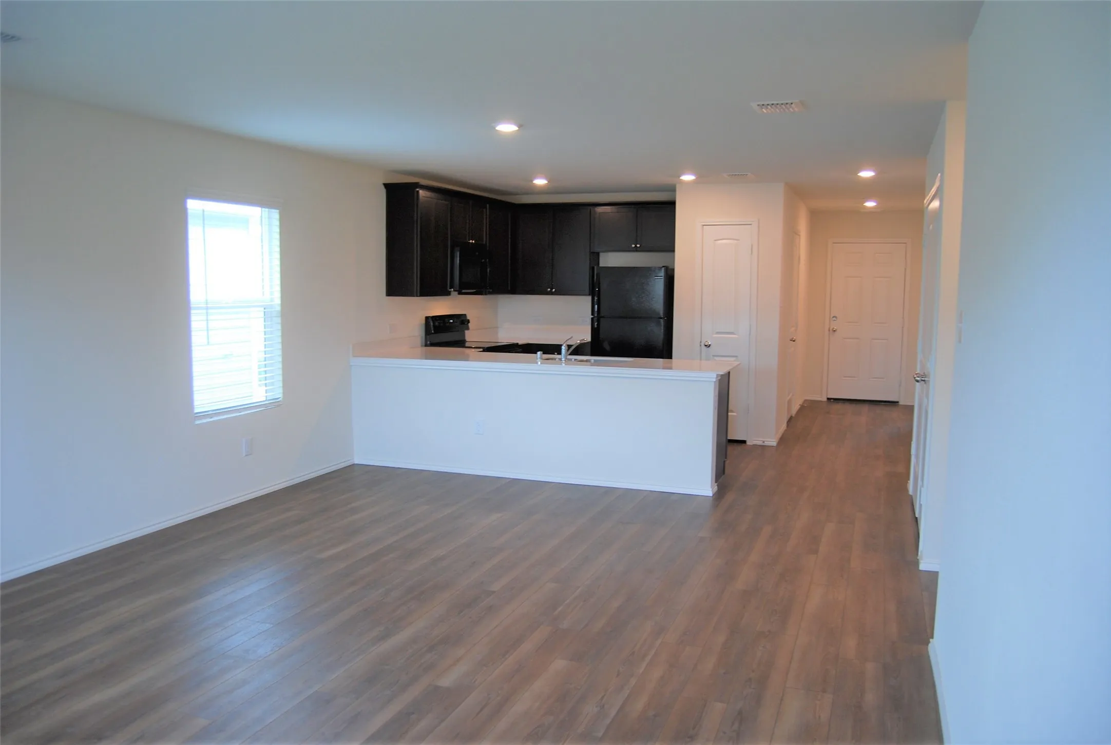 Open concept kitchen with room for dining.
