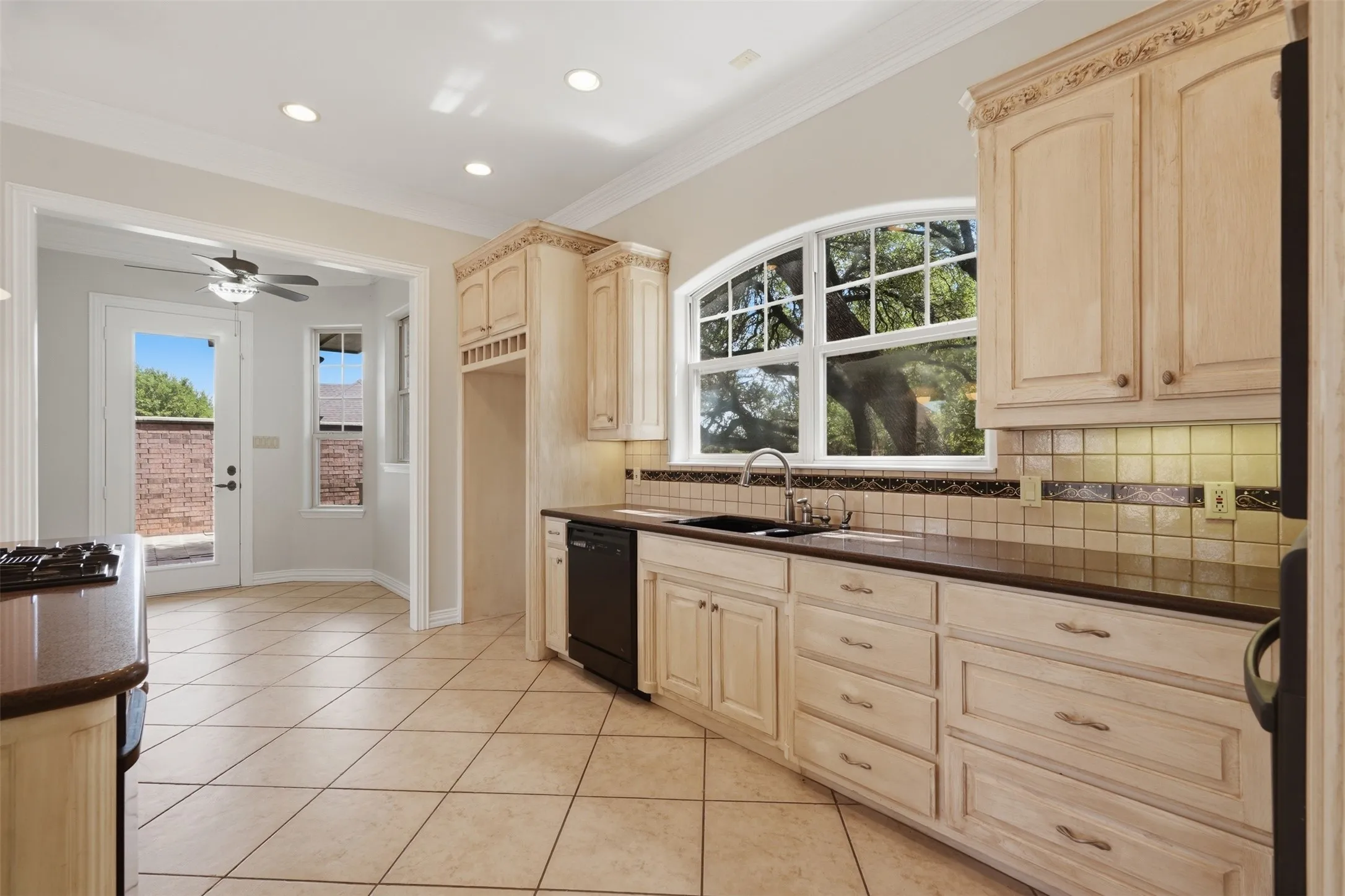 Kitchen with huge windows is light and bright!