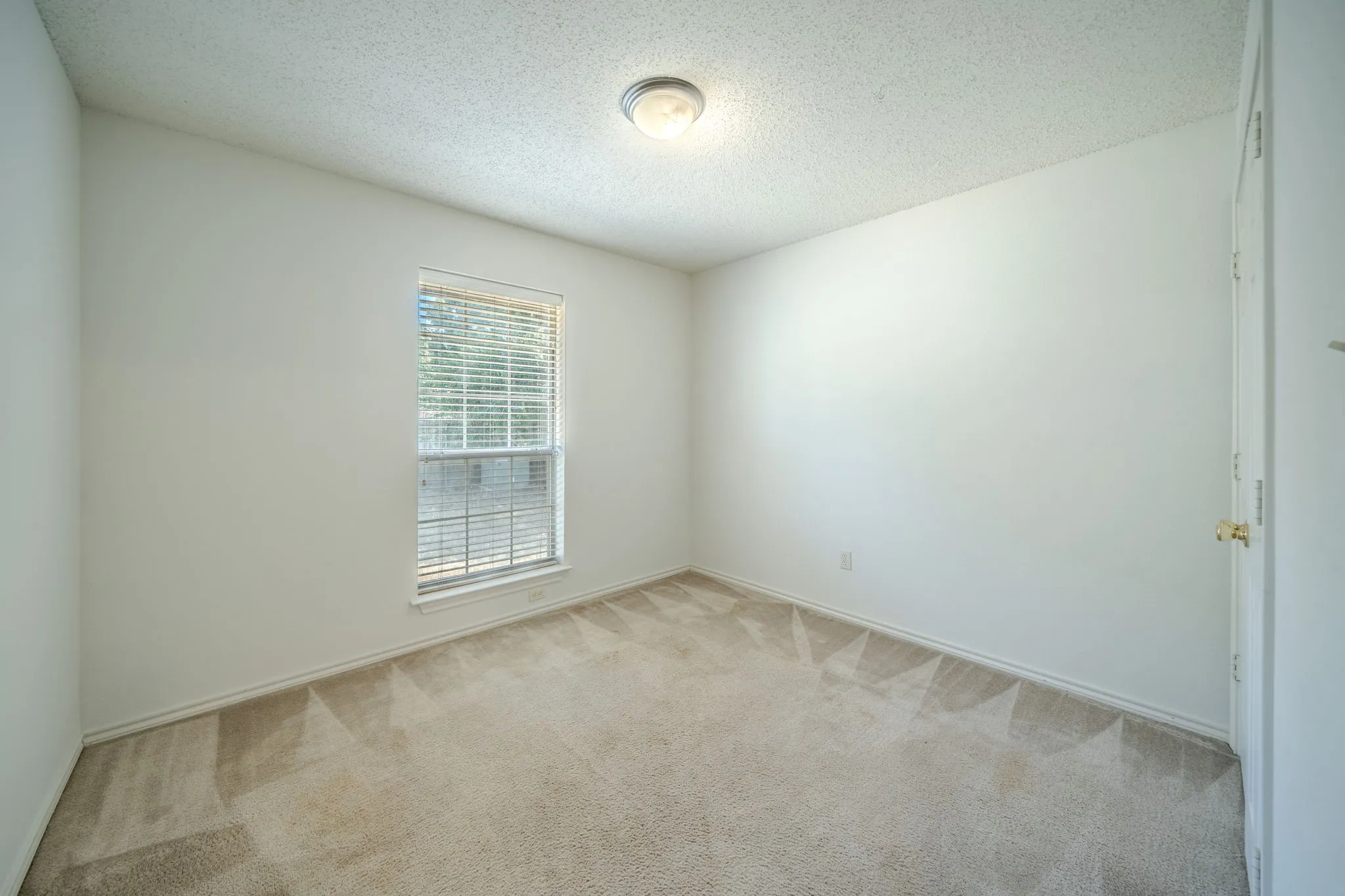 3rd bedroom with natural light.