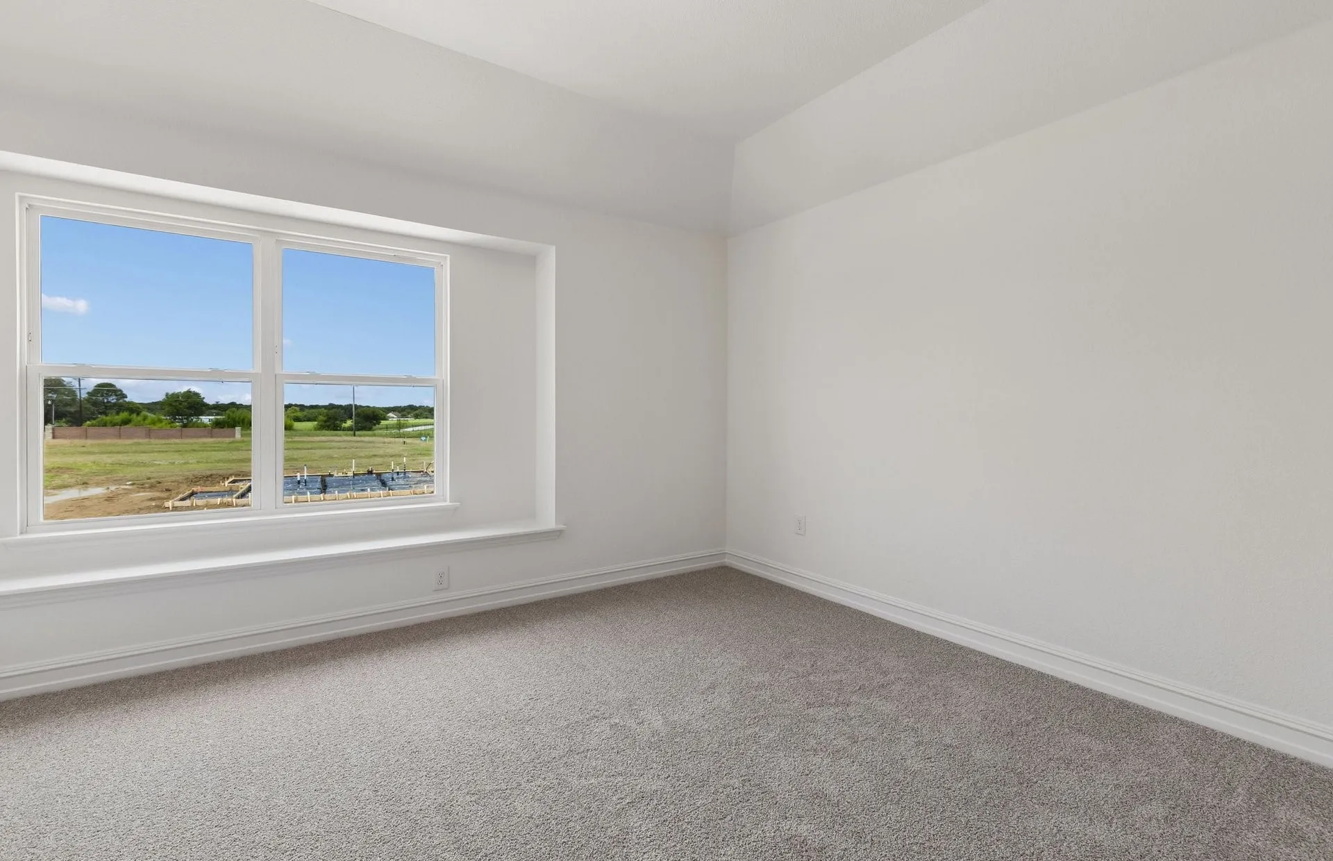 *Floorplan representation, not actual home - Spacious secondary bedroom with large windows