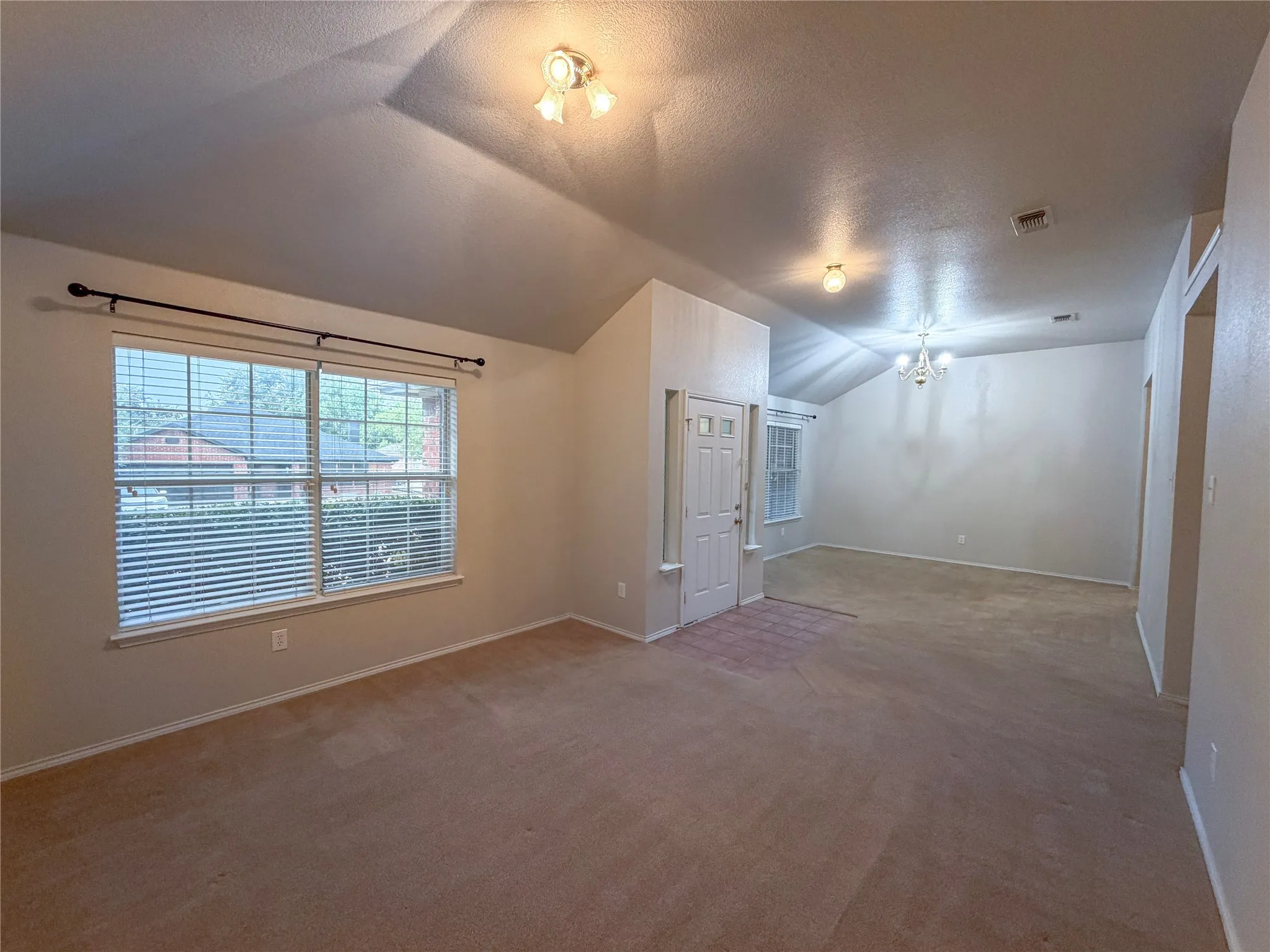 Entry, Formal Living Room, & Formal Dining