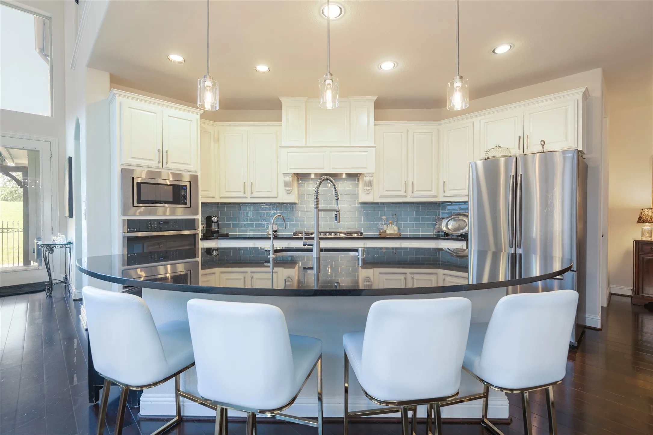 Kitchen includes island, stainless appliance package.