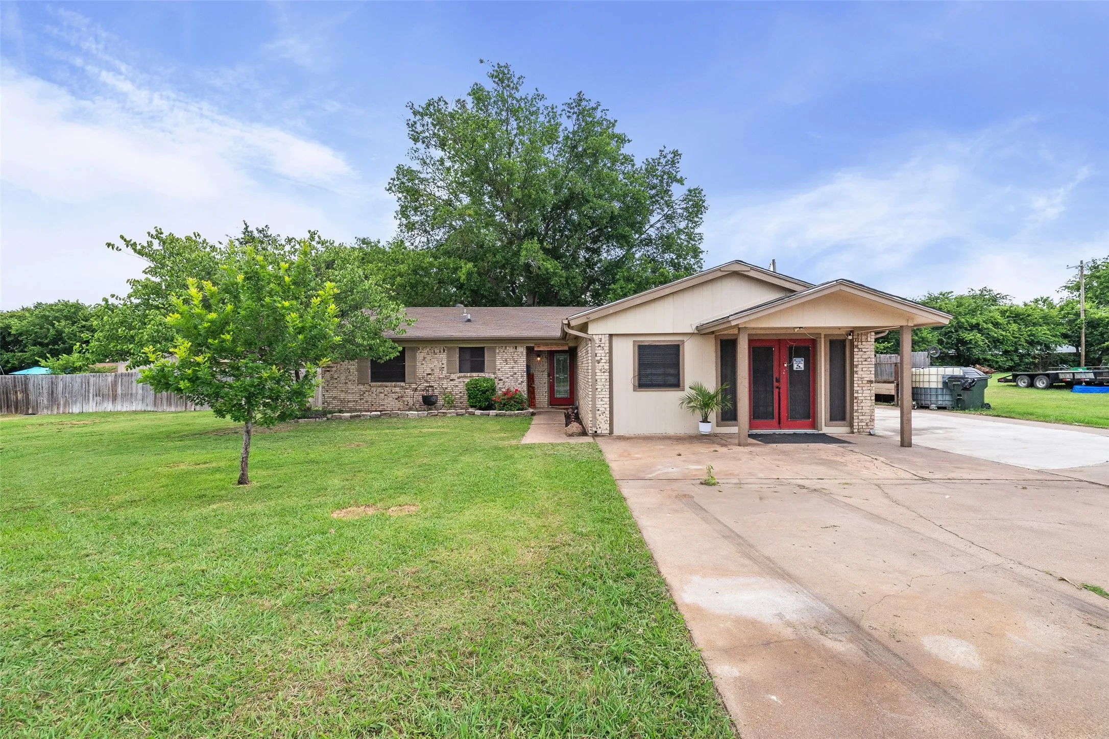 A rare property featuring a 3-bedroom, 2-bath main home, detached apartment, shop, chicken coop, and playhouse. All in one setting.