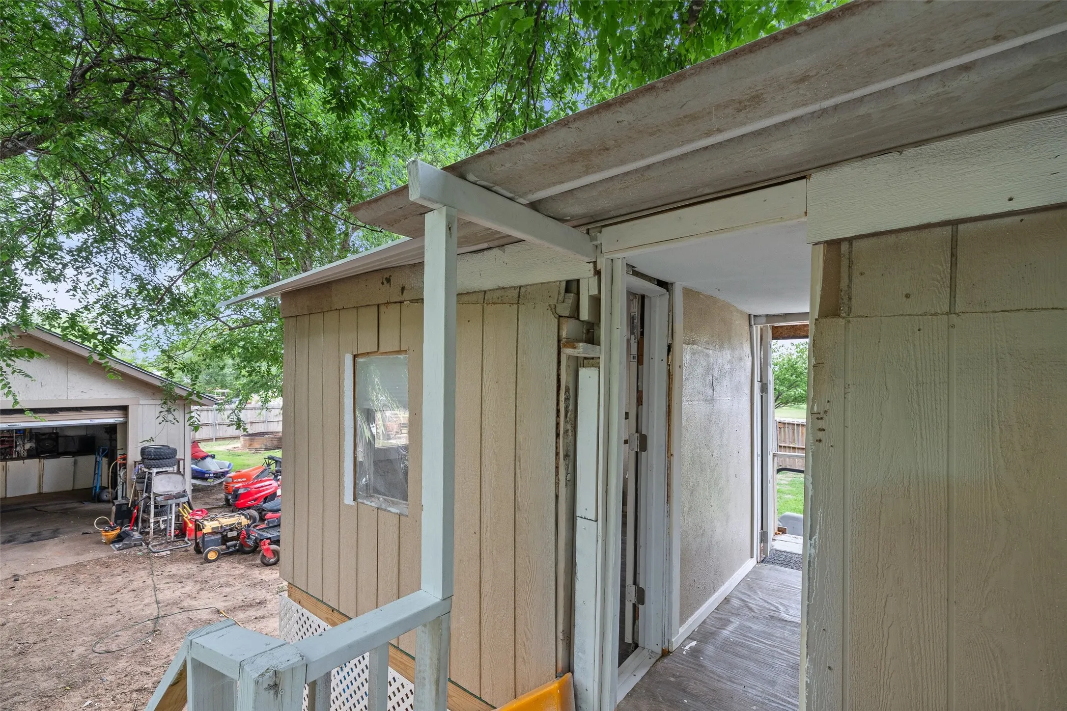 A rare property featuring a 3-bedroom, 2-bath main home, detached apartment, shop, chicken coop, and playhouse. All in one setting.