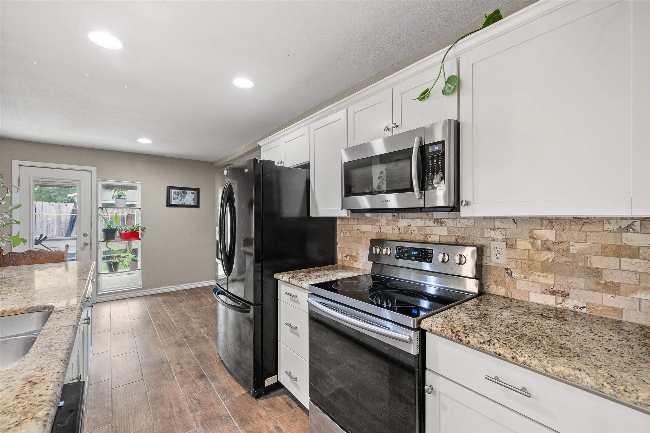 A rare property featuring a 3-bedroom, 2-bath main home, detached apartment, shop, chicken coop, and playhouse. All in one setting.