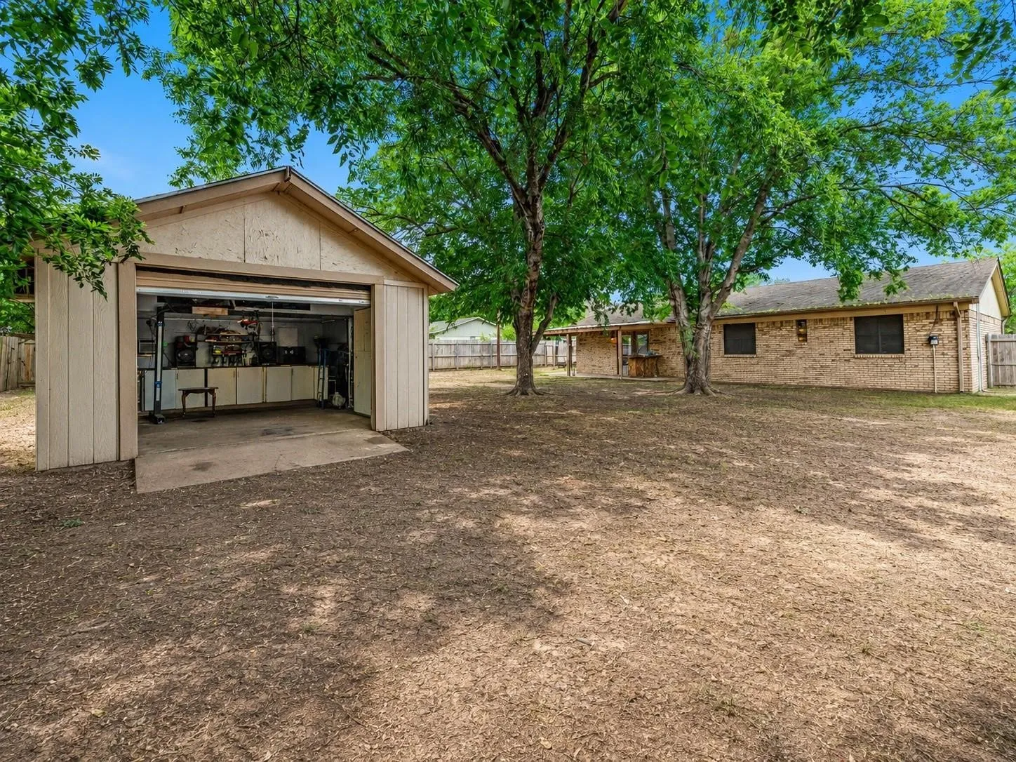 A rare property featuring a 3-bedroom, 2-bath main home, detached apartment, shop, chicken coop, and playhouse. All in one setting.