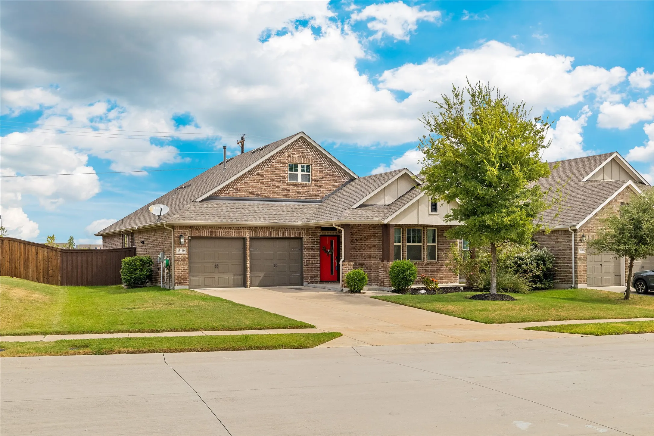 Exterior of the house in a quaint neighborhood in Prosper