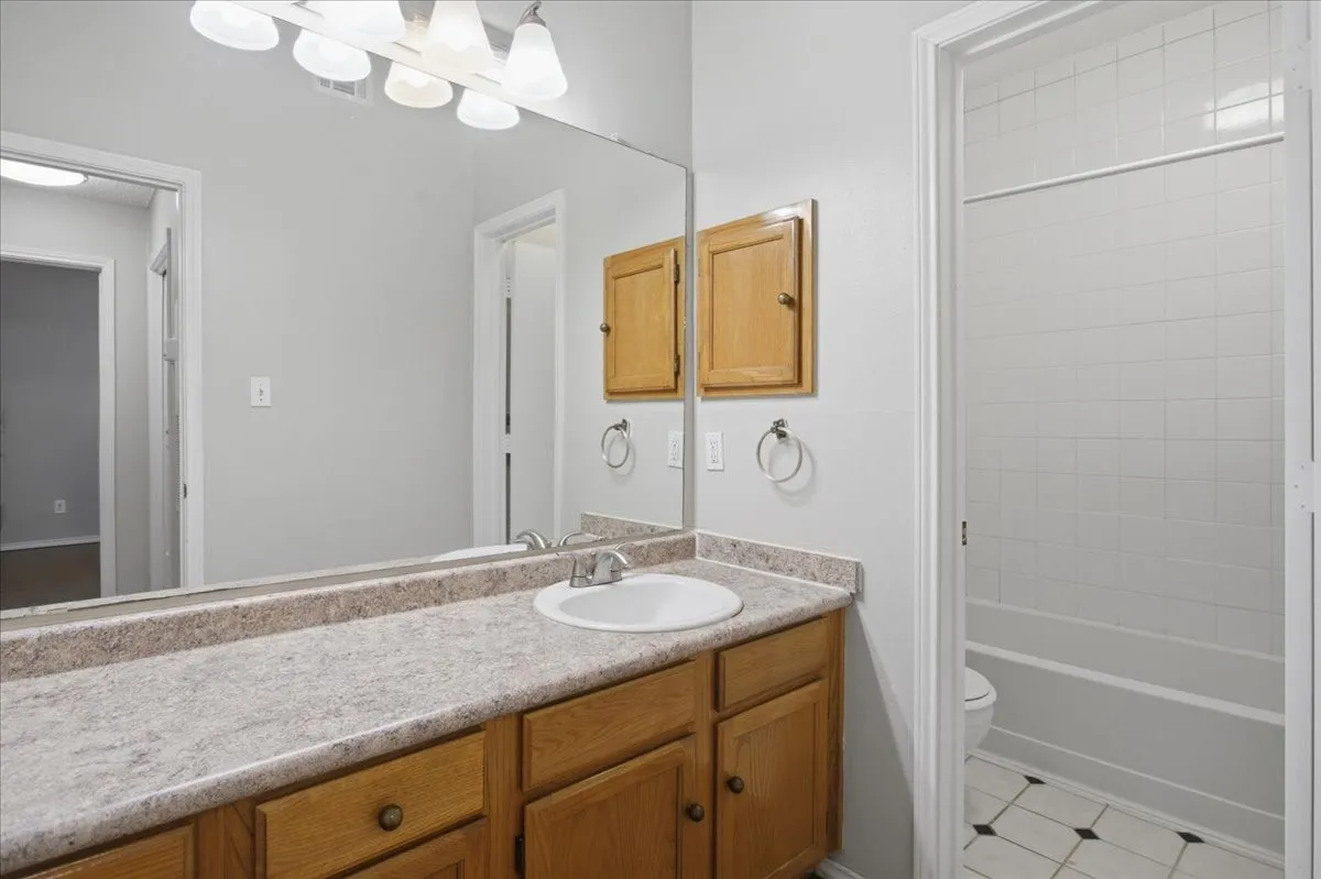 Single vanity with generous storage
