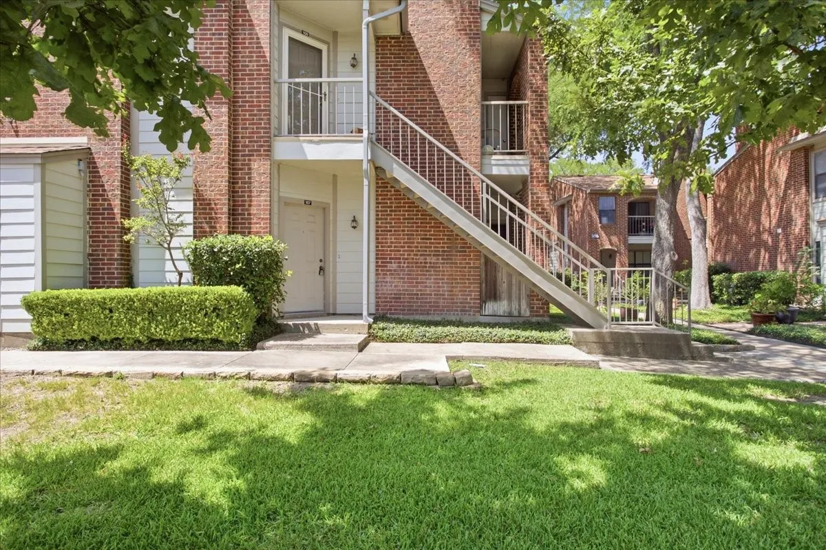 View of the front door from approximate location of reserved parking space