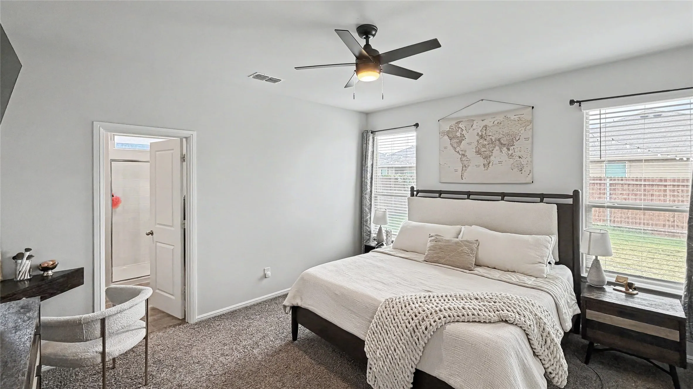 Spacious, inviting bedroom offering a peaceful retreat with plenty of natural light and room to relax.