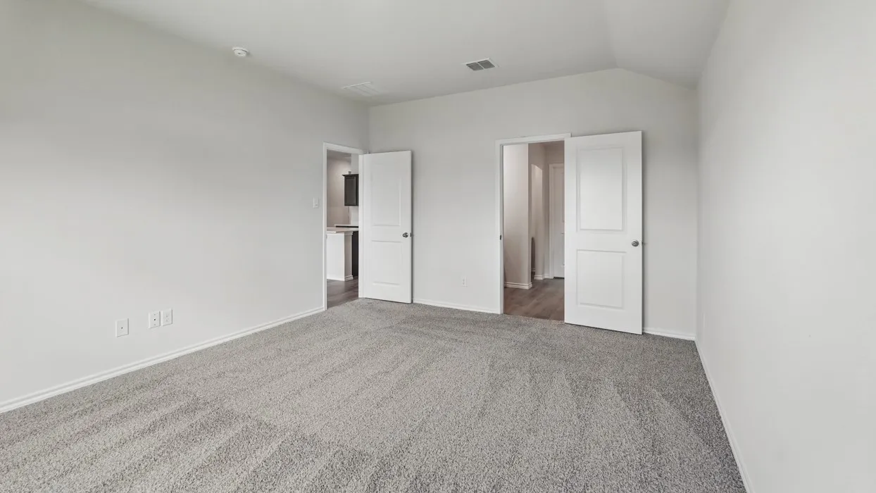 Plush gray carpeting, white walls, and bright white doors