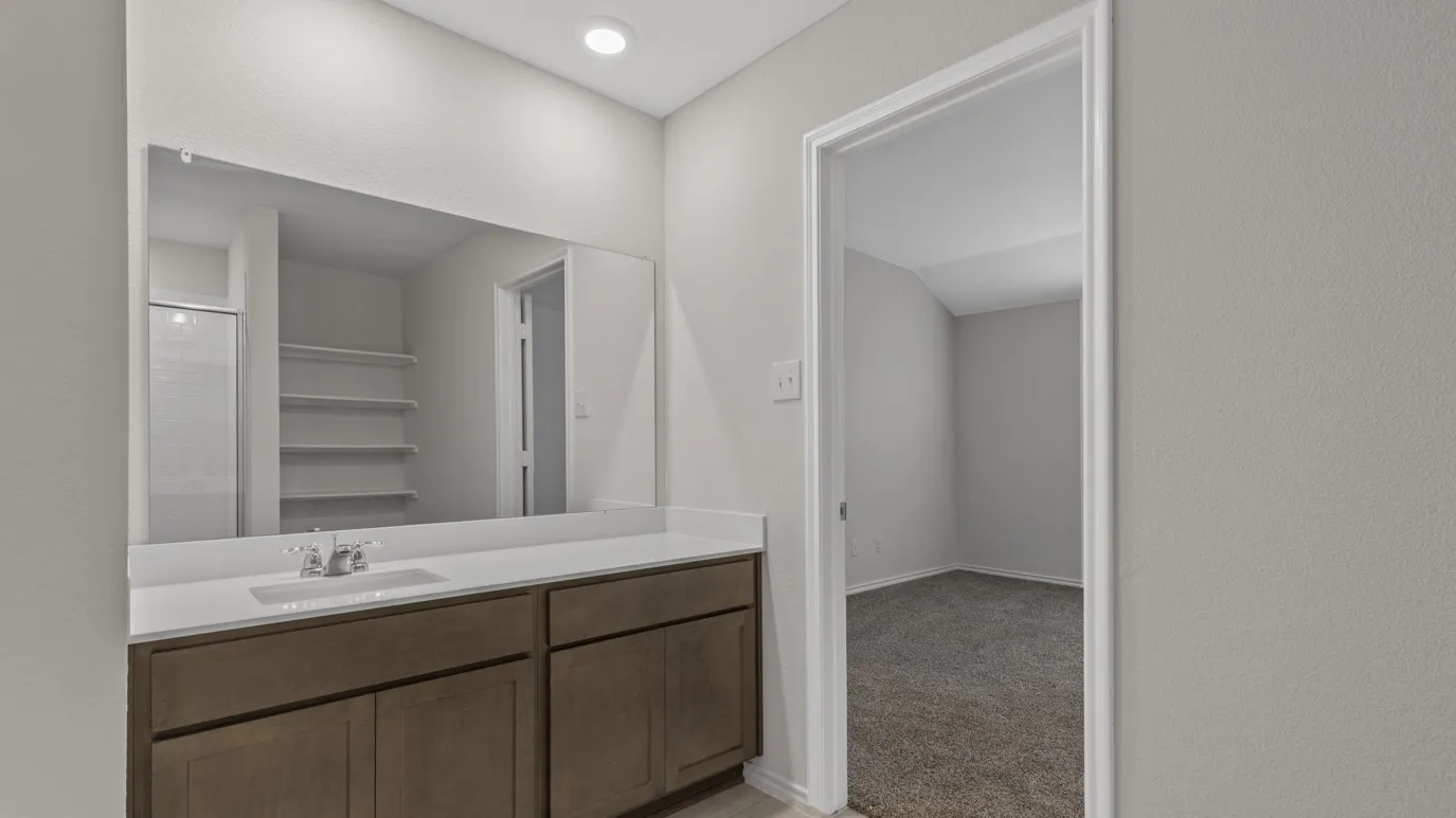 Dual vanity with a white countertop and rectangular sink
