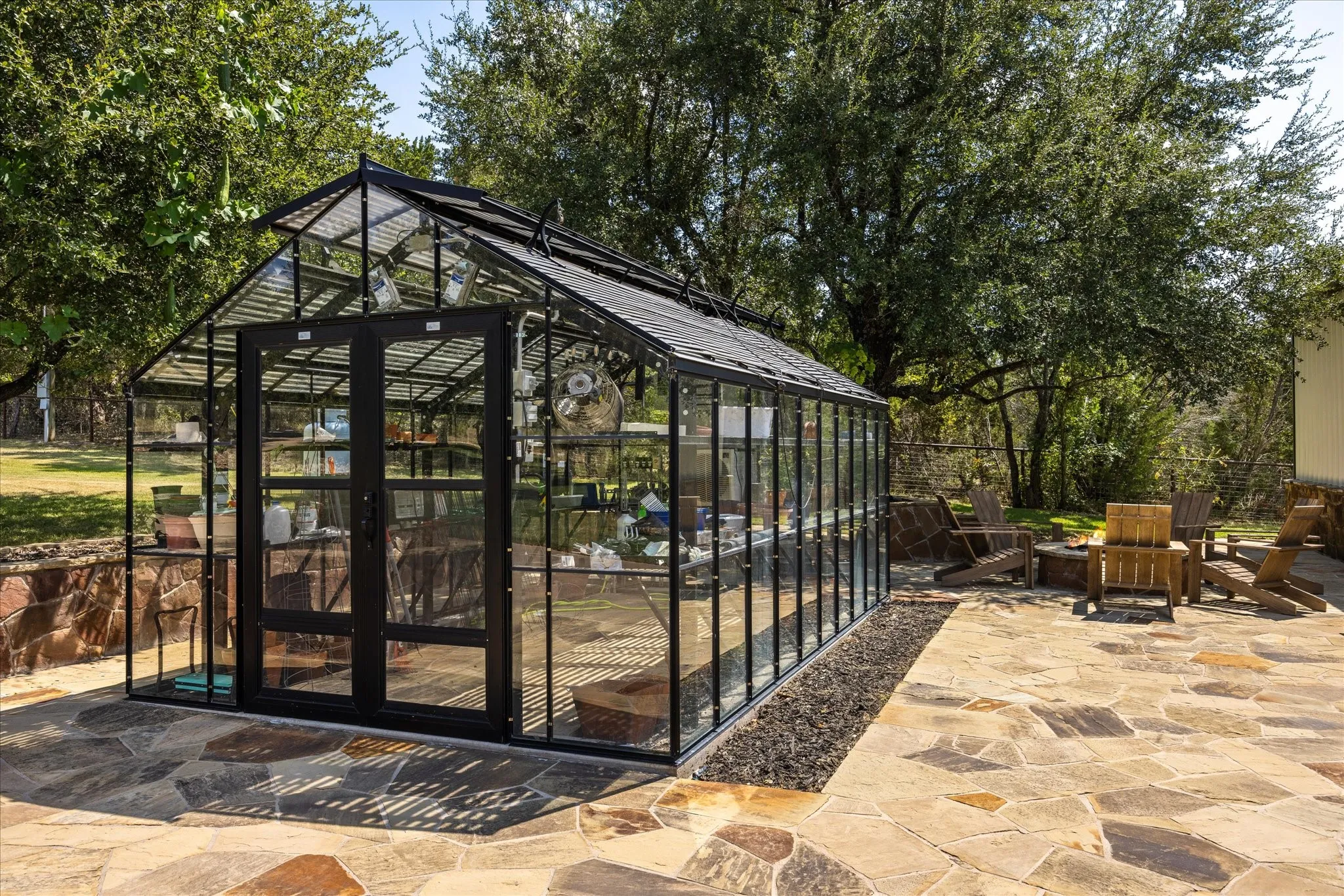 Green house with firepit