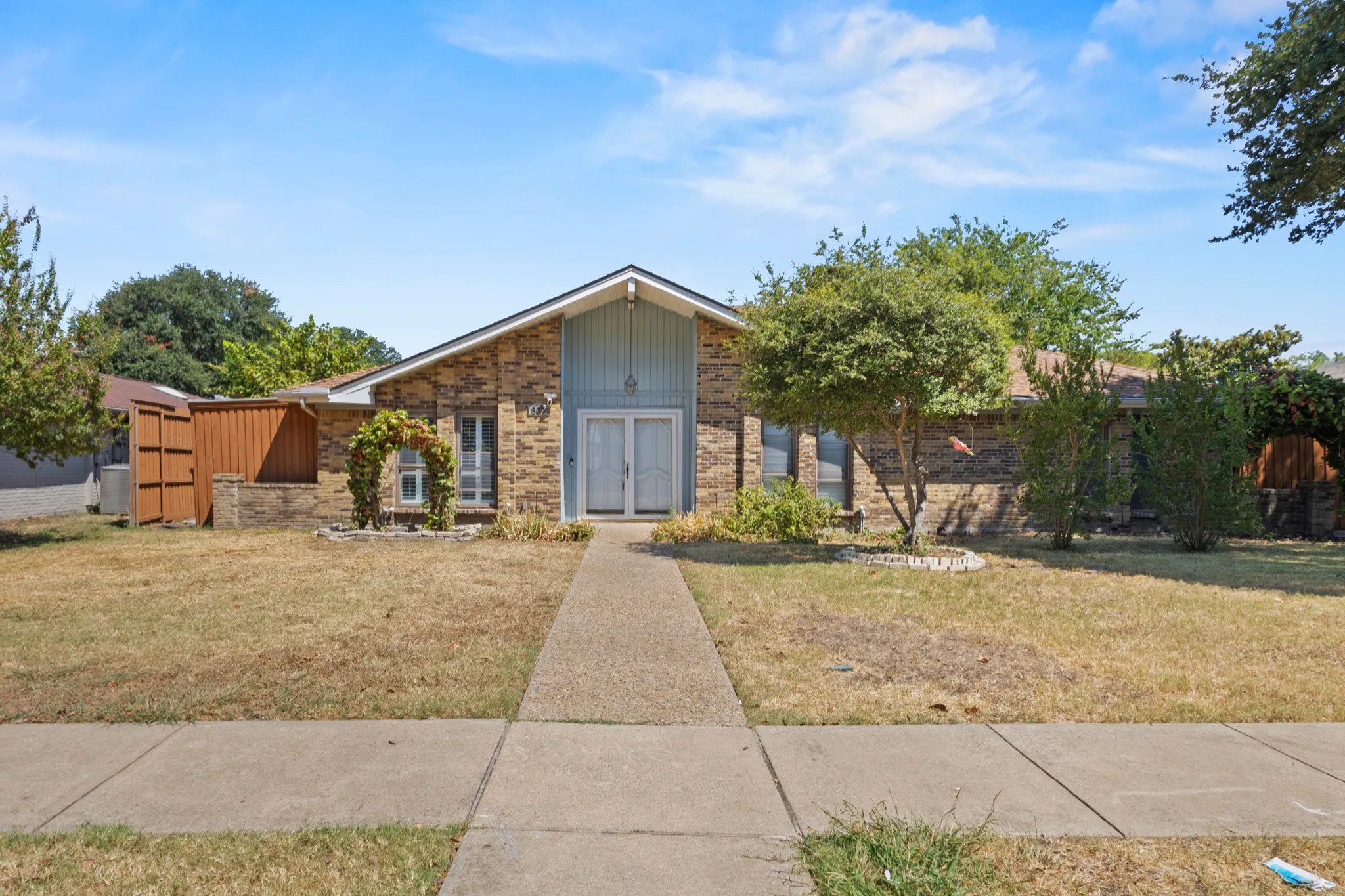 Brick exterior with a prominent A-frame architectural element