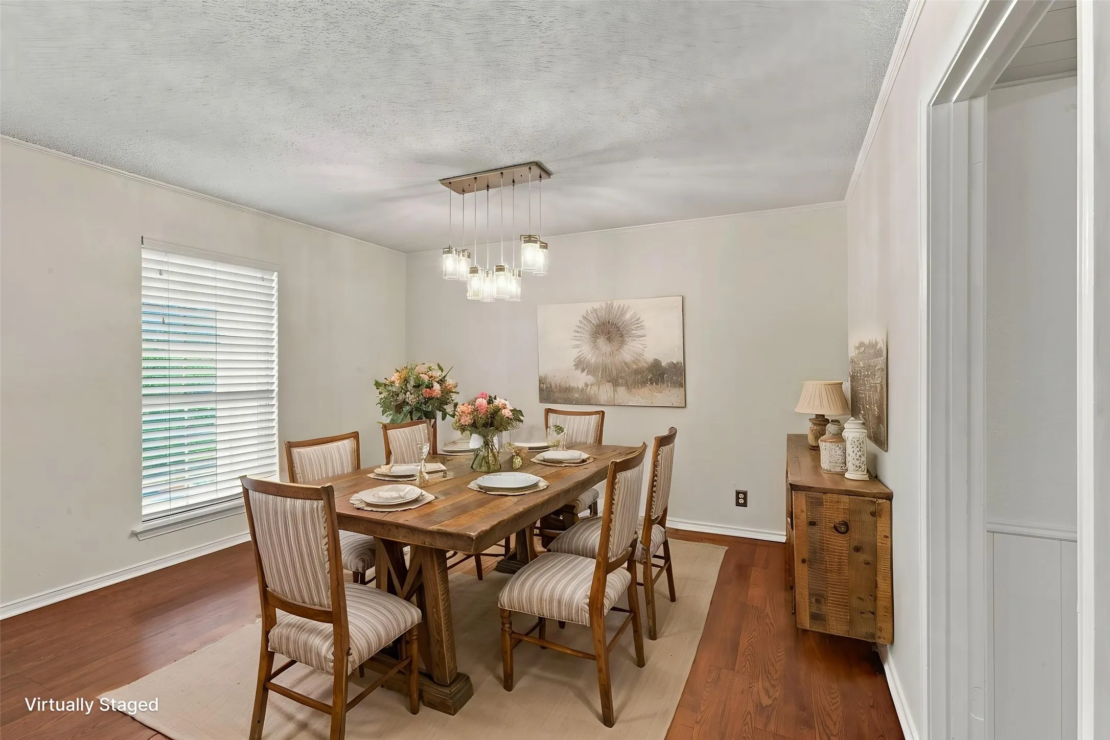 Wood-finish flooring and a multi-pendant lighting fixture