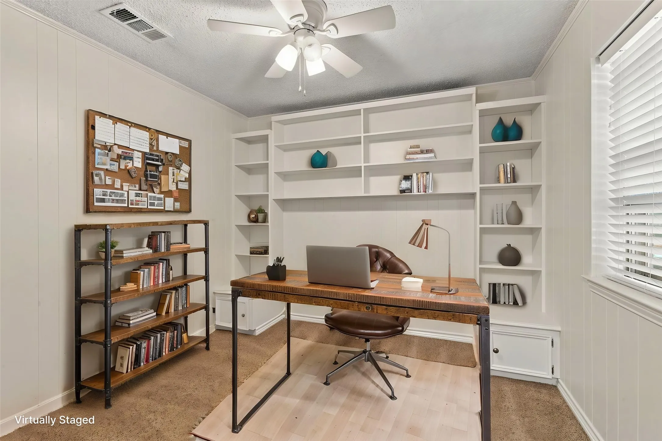 Built-in shelving and ceiling fan