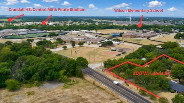 Side of the lot showing area schools & football stadium