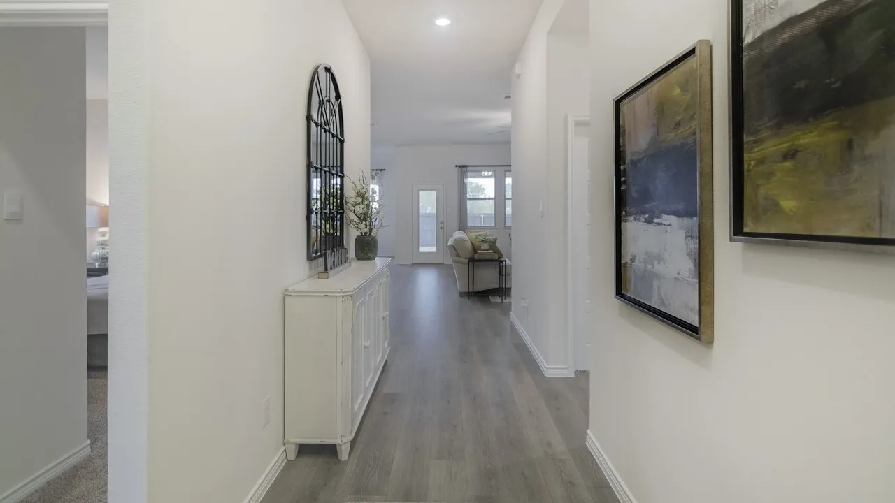 Hard-surface flooring throughout, recessed lighting, and crisp white walls