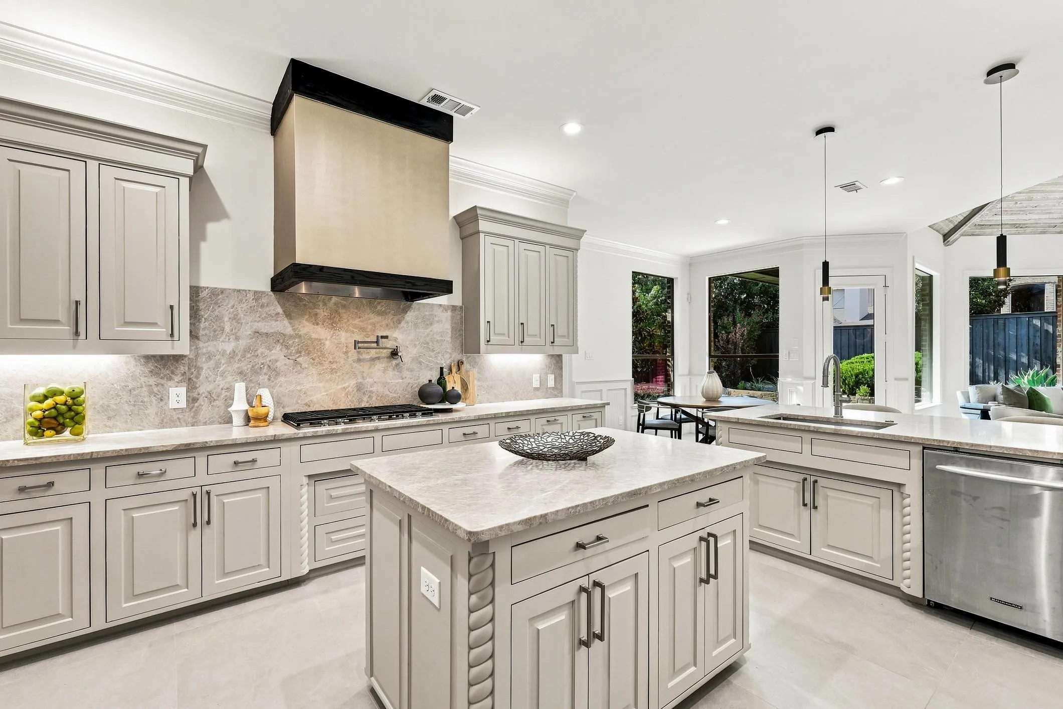 Incredible views from oversized kitchen overlooking nook and living area. An abundance of cabinet space and masterful detailed trim work through out the kitchen area. New designer hardware on all cabinets and doors.