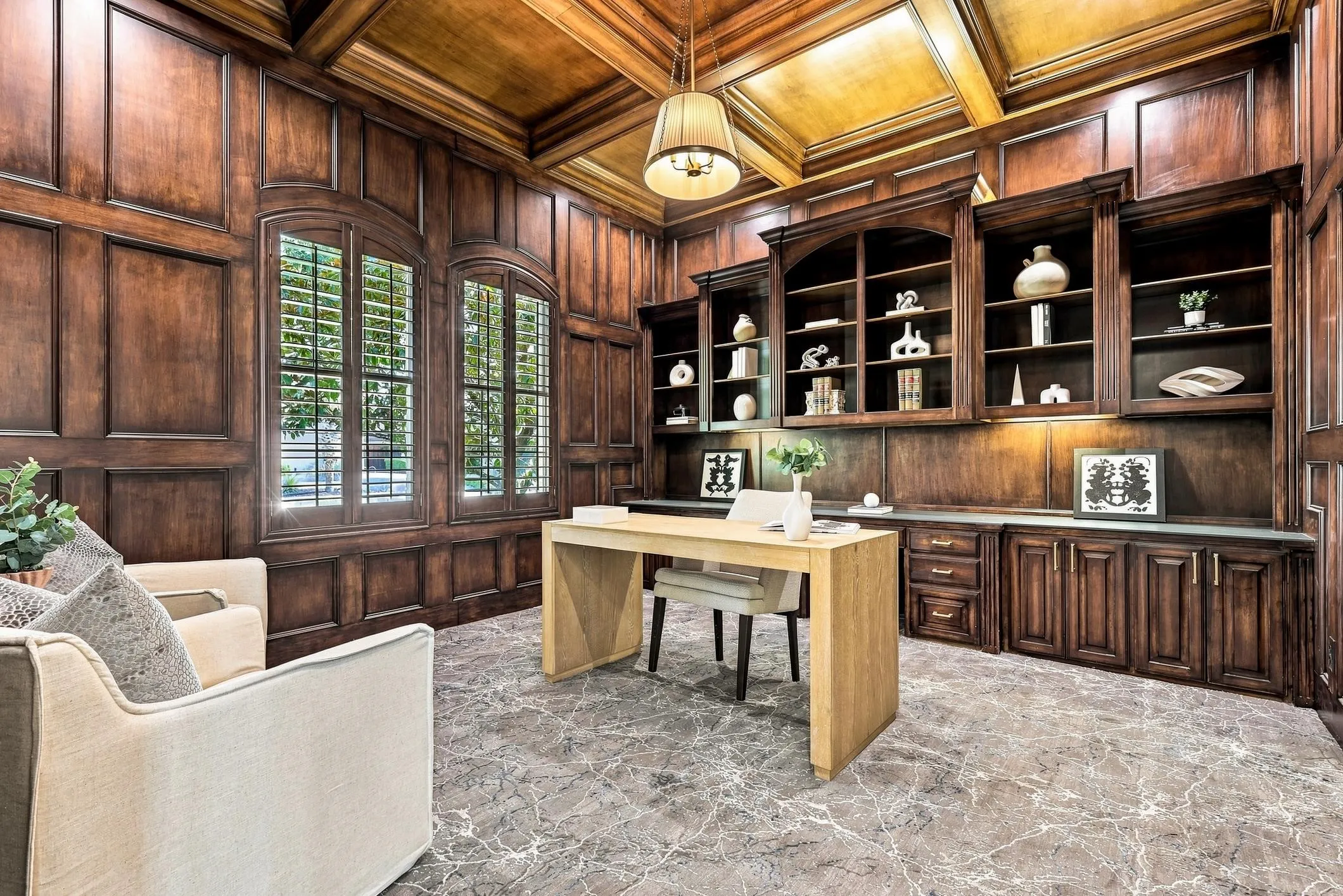 High end finish out in this exclusive executive office. Features include custom wood trimmed tier ceiling, built-in desk and cabinets, designer carpet and lighting, wooded shutters and solid wood doors for privacy.