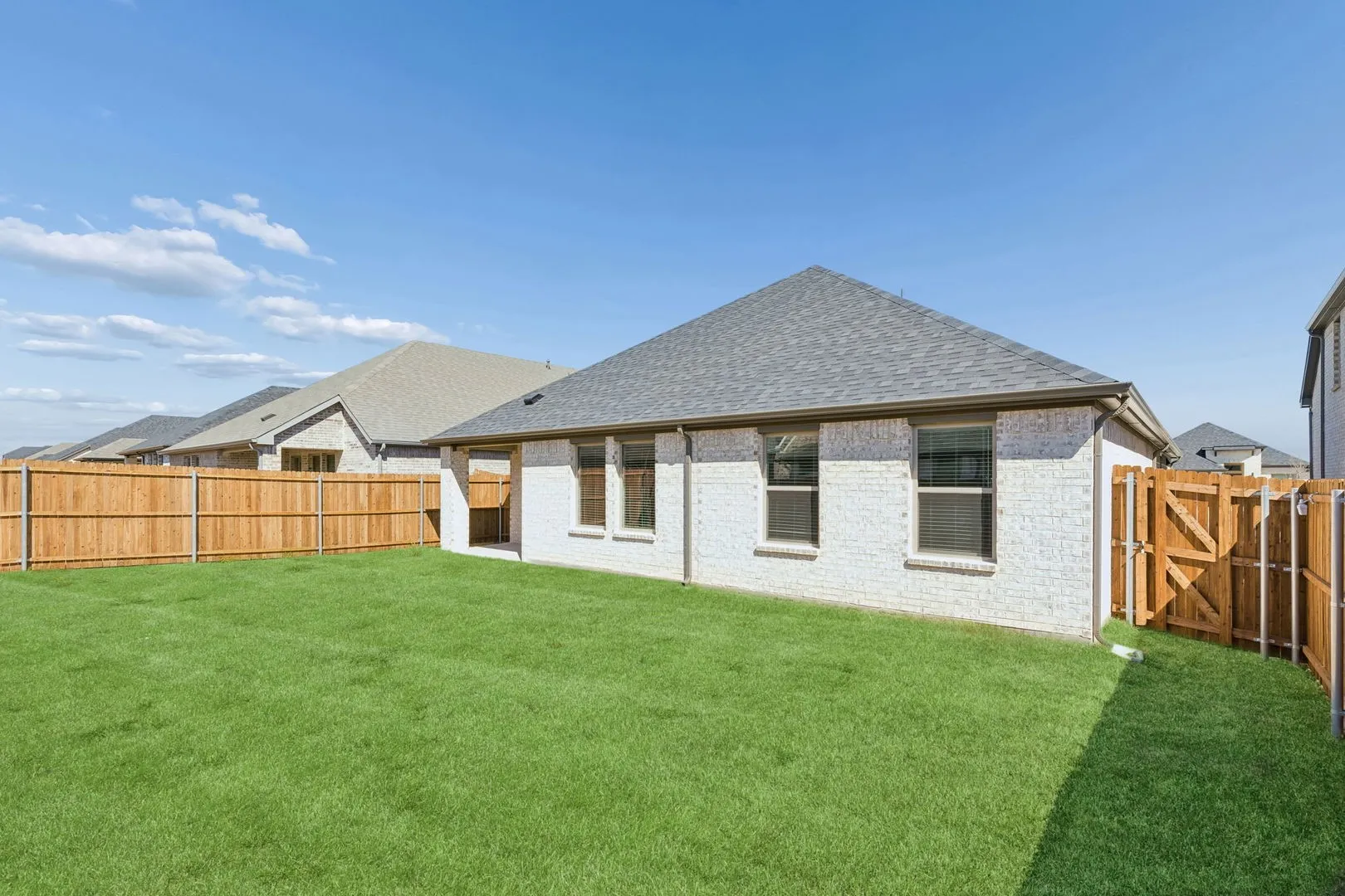 Covered Patio in the Harrison home plan by Trophy Signature Homes - REPRESENTATIVE PHOTO