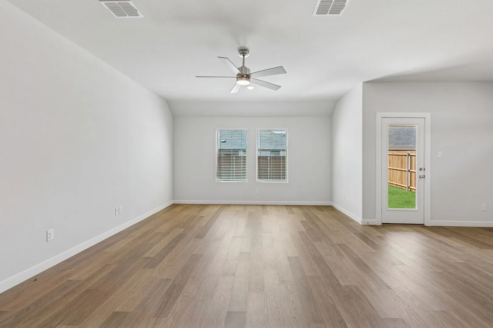 Living Room in the Harrison home plan by Trophy Signature Homes - REPRESENTATIVE PHOTO