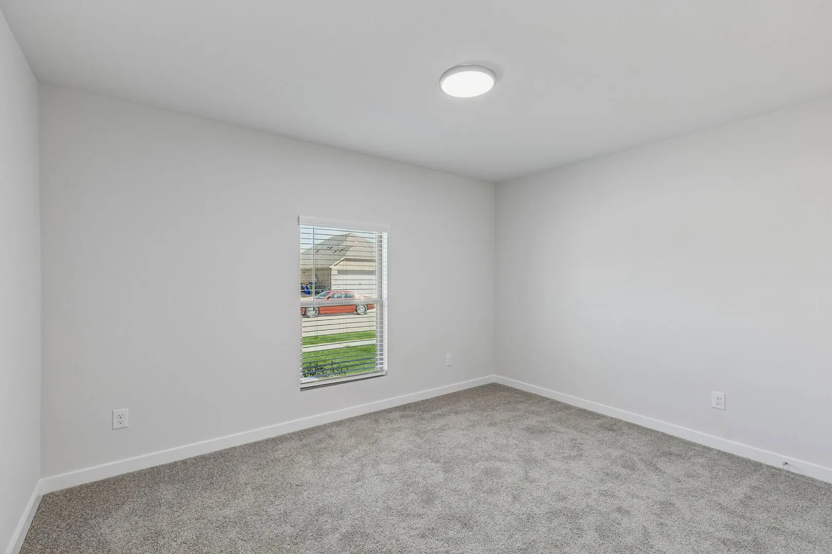 Bedroom in the Harrison home plan by Trophy Signature Homes - REPRESENTATIVE PHOTO