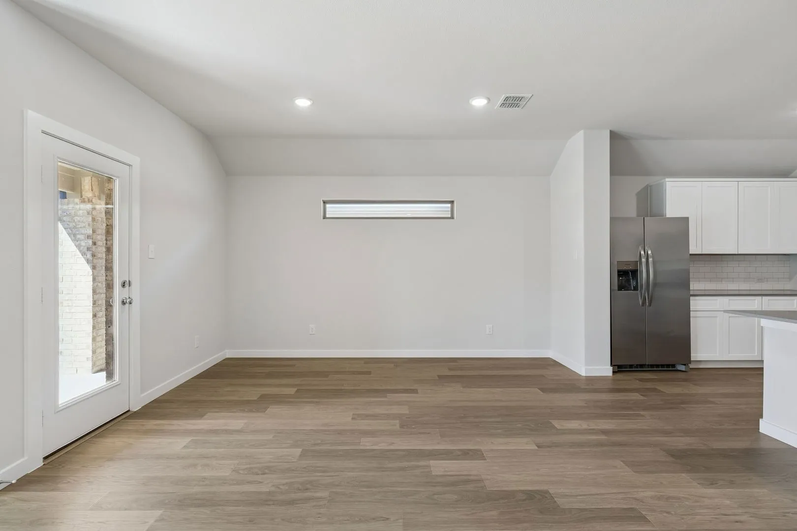 Living Room in the Harrison home plan by Trophy Signature Homes - REPRESENTATIVE PHOTO