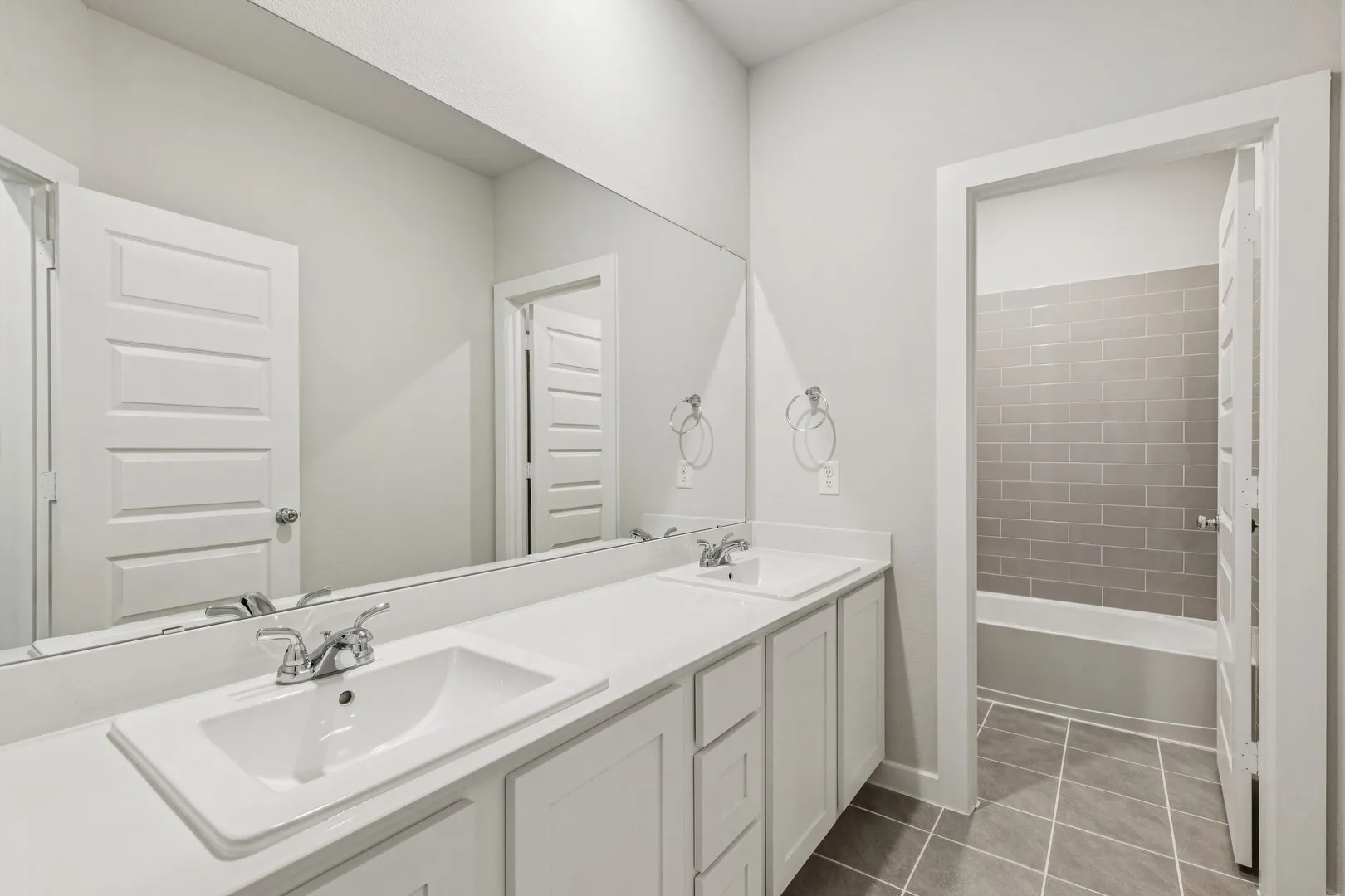 Bathroom in the Winters home plan by Trophy Signature Homes – REPRESENTATIVE PHOTO