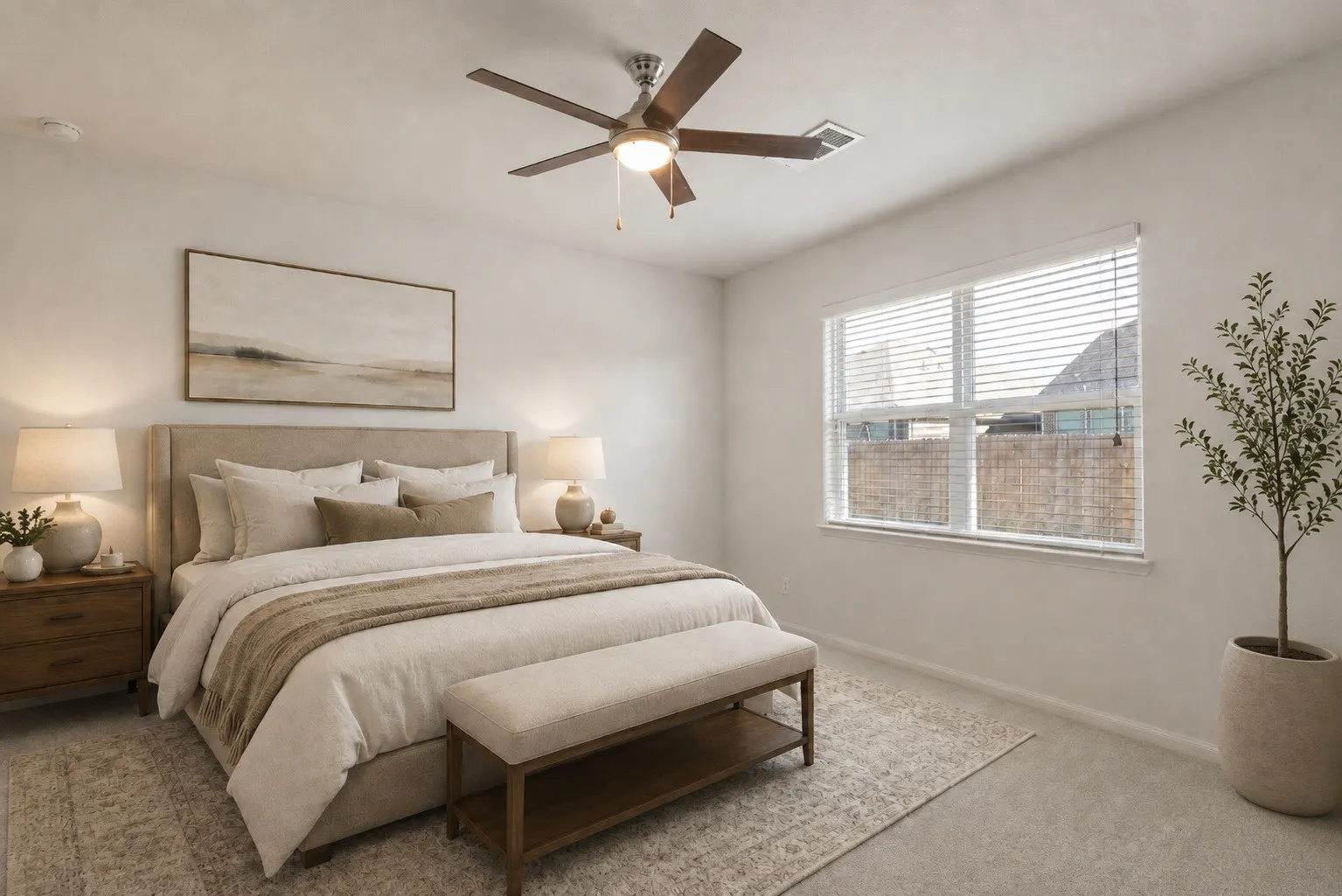 Virtually staged primary bedroom showcasing how the space could be furnished and styled.