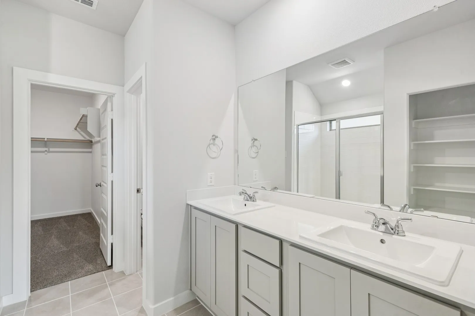Primary Bathroom in the Oscar home plan by Trophy Signature Homes – REPRESENTATIVE PHOTO