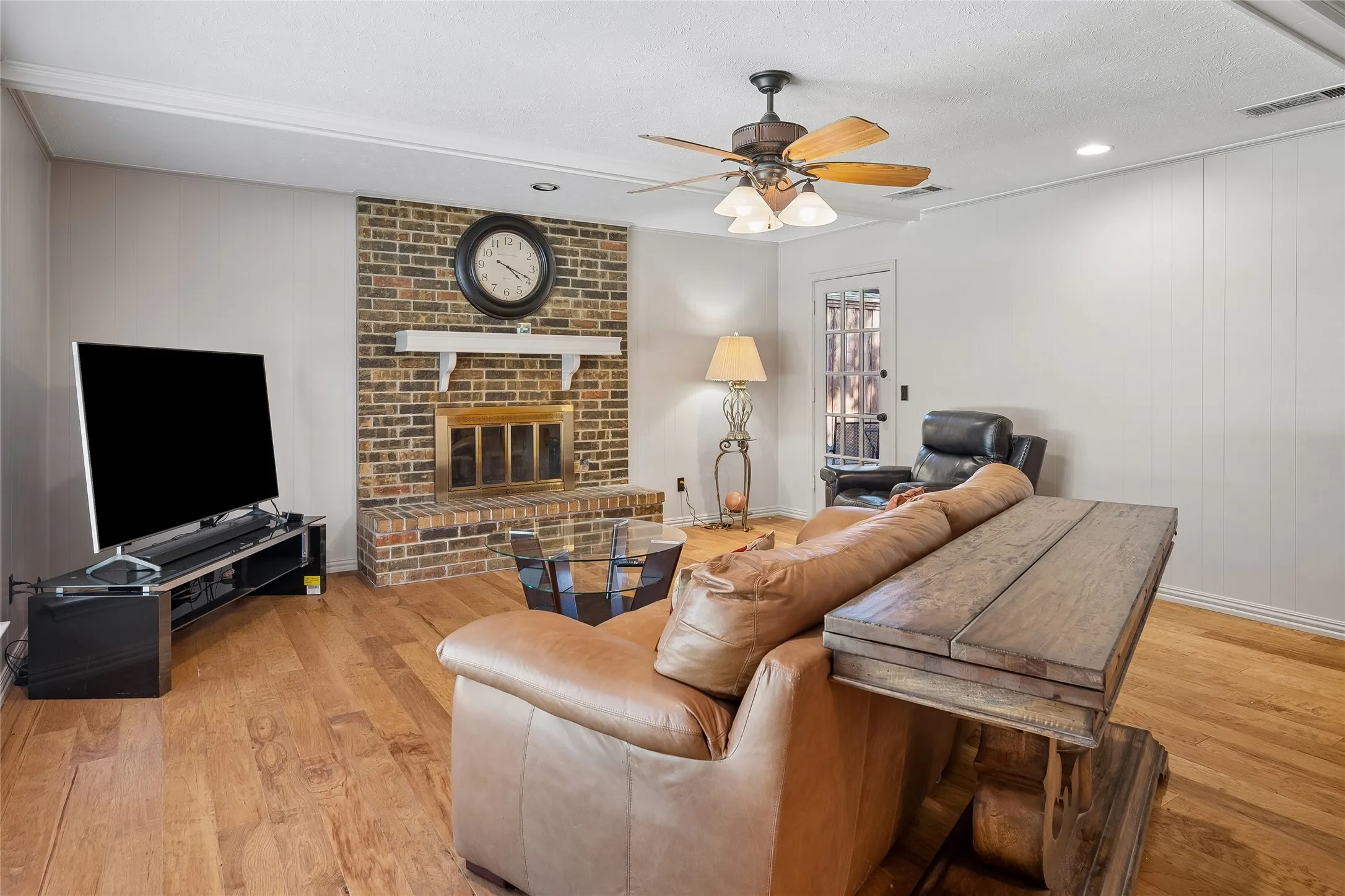 Living room with wood burning fireplace