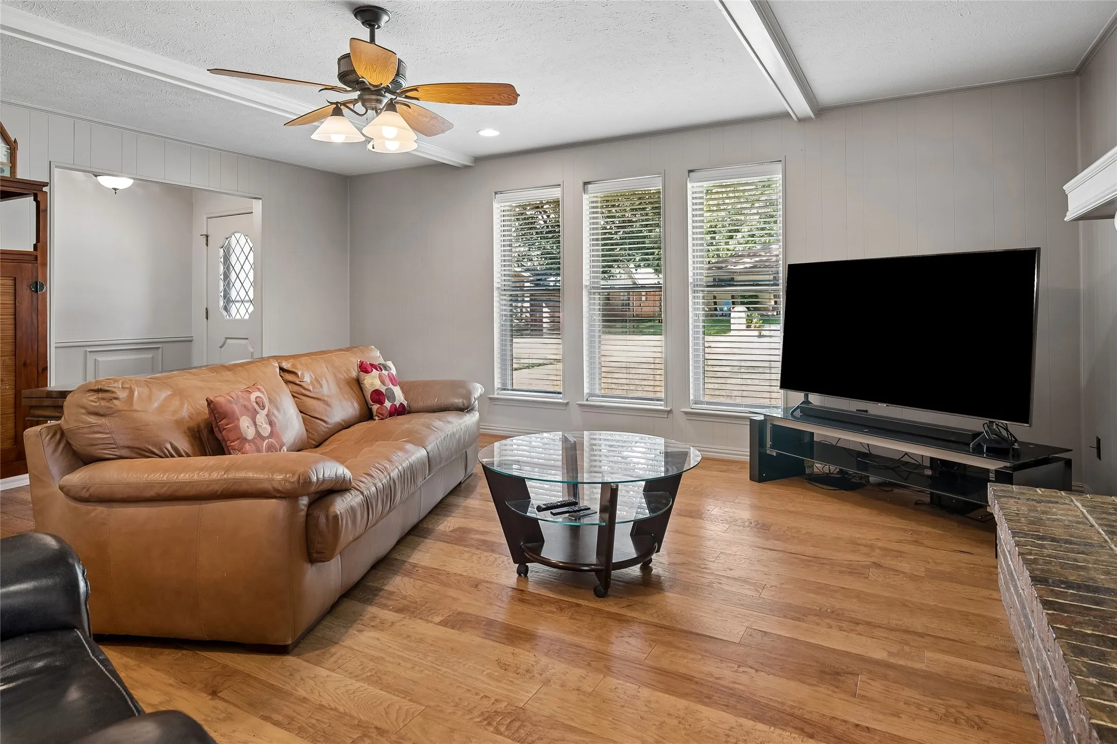 Spacious living room with wall of windows
