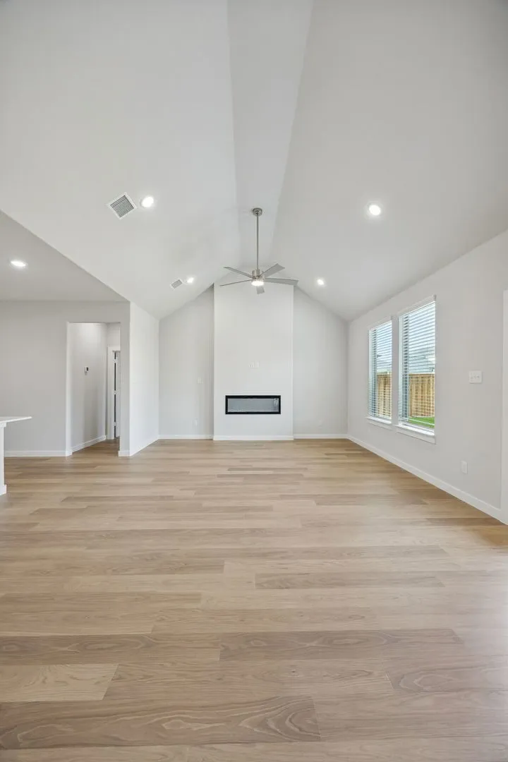 Living Room in the Masters home plan by Trophy Signature Homes – REPRESENTATIVE PHOTO