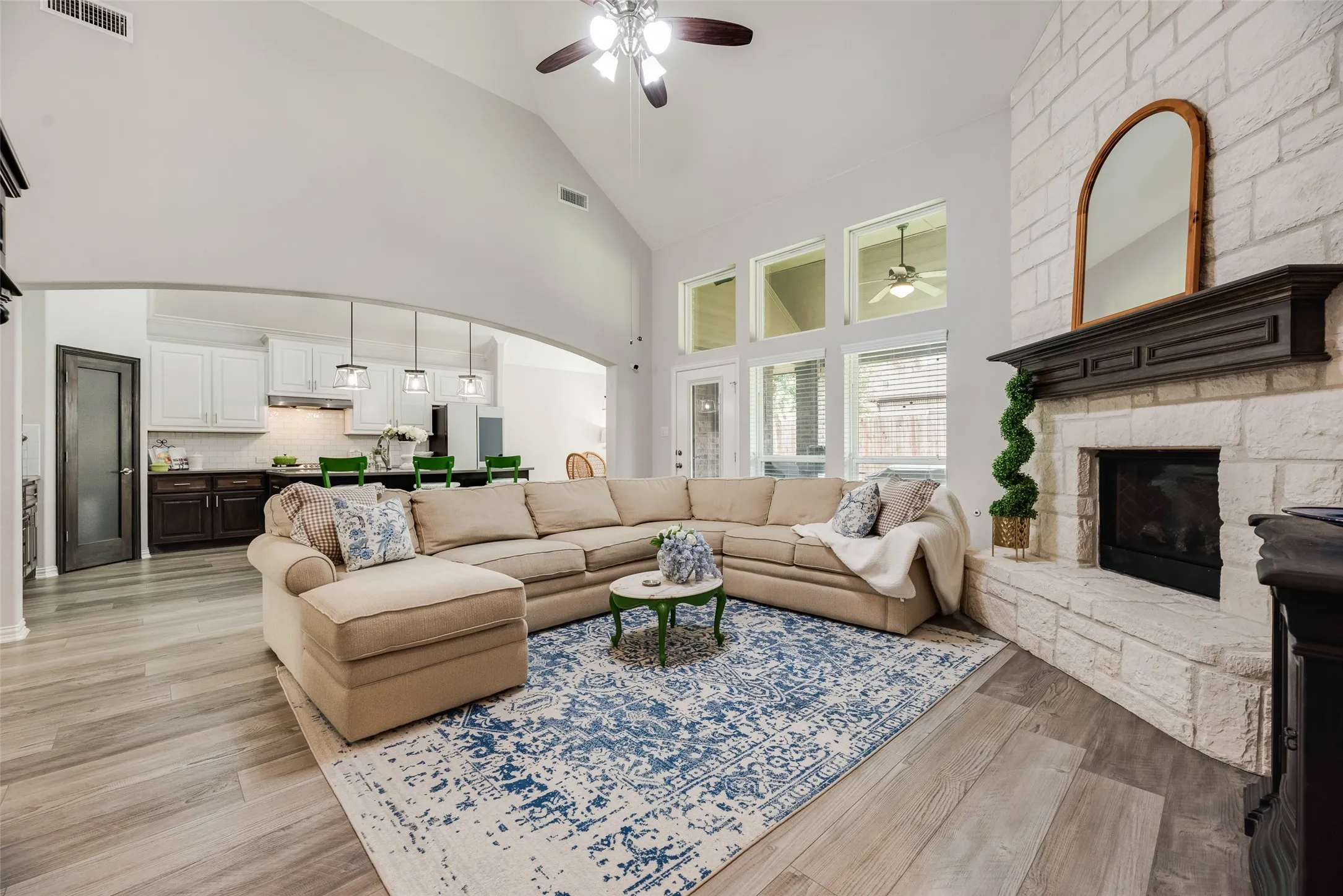 Floor to ceiling gas stone fireplace
