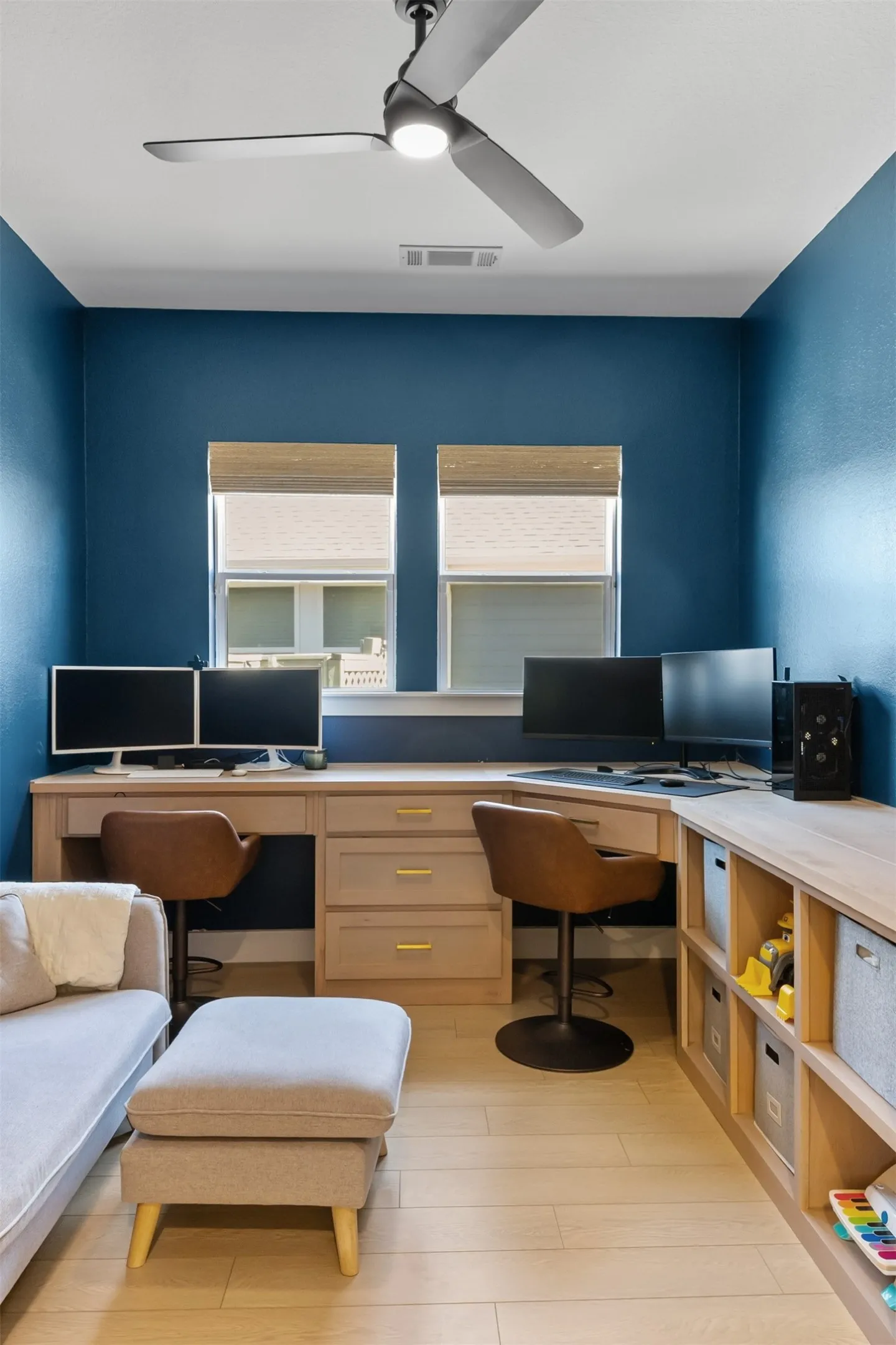 Built-in desks with integrated drawers and open shelving