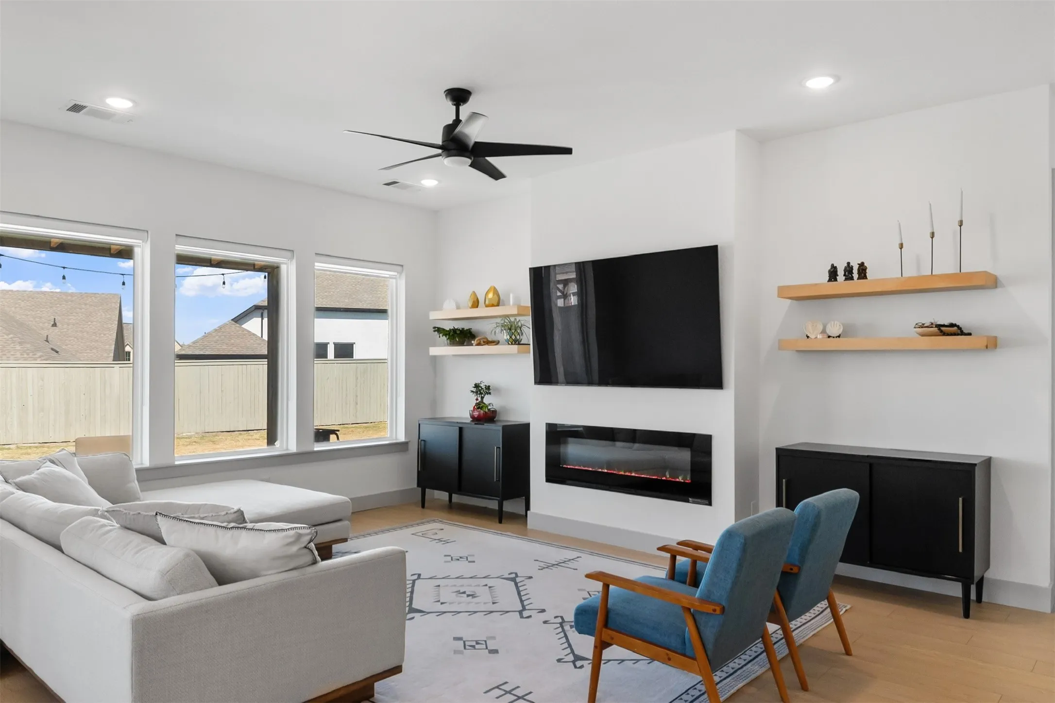 Recessed lighting and a ceiling fan with integrated light