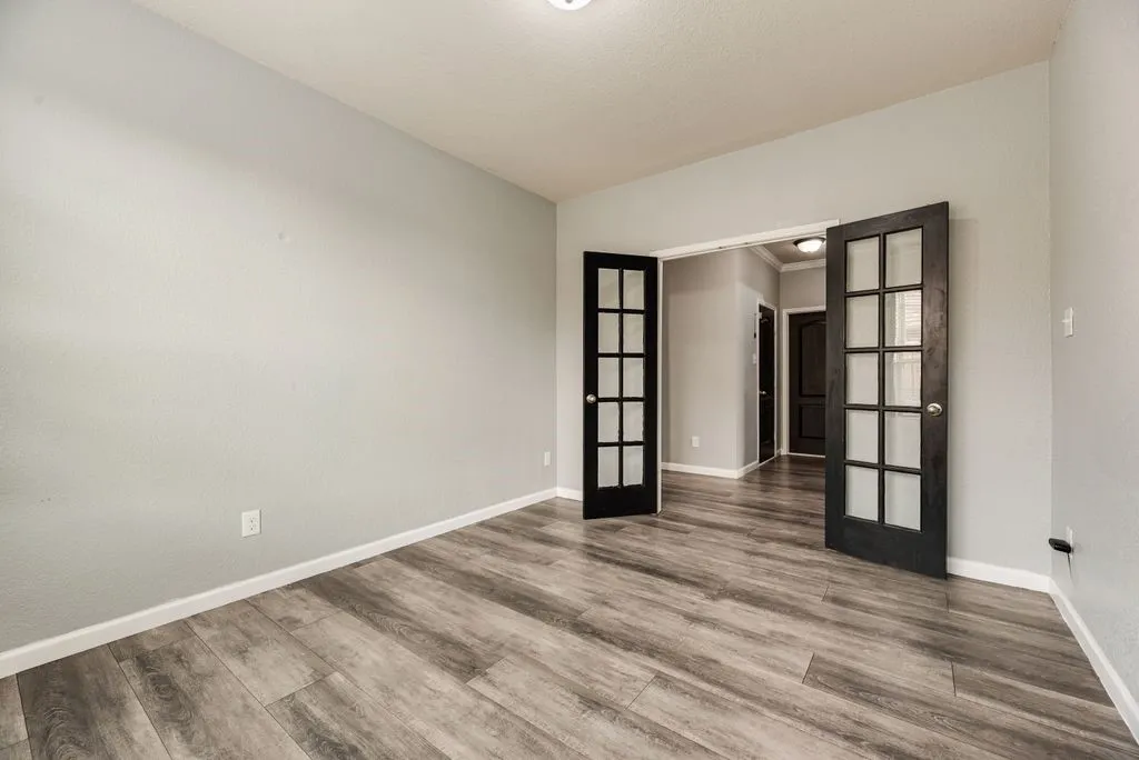 Wood-finish flooring with a neutral paint palette and white trim