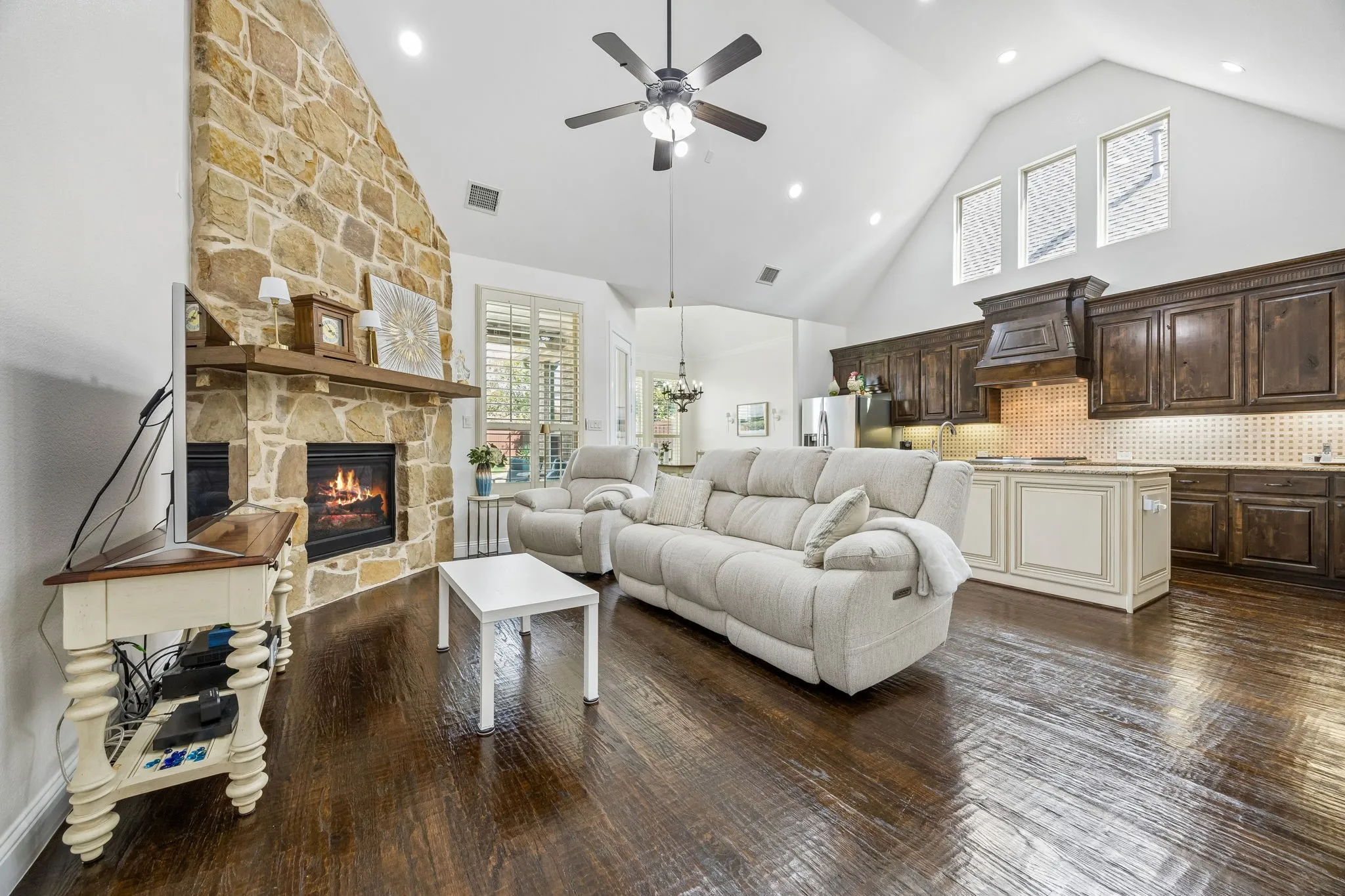 Vaulted ceilings.  Floor to ceiling stone fireplace with gas logs.